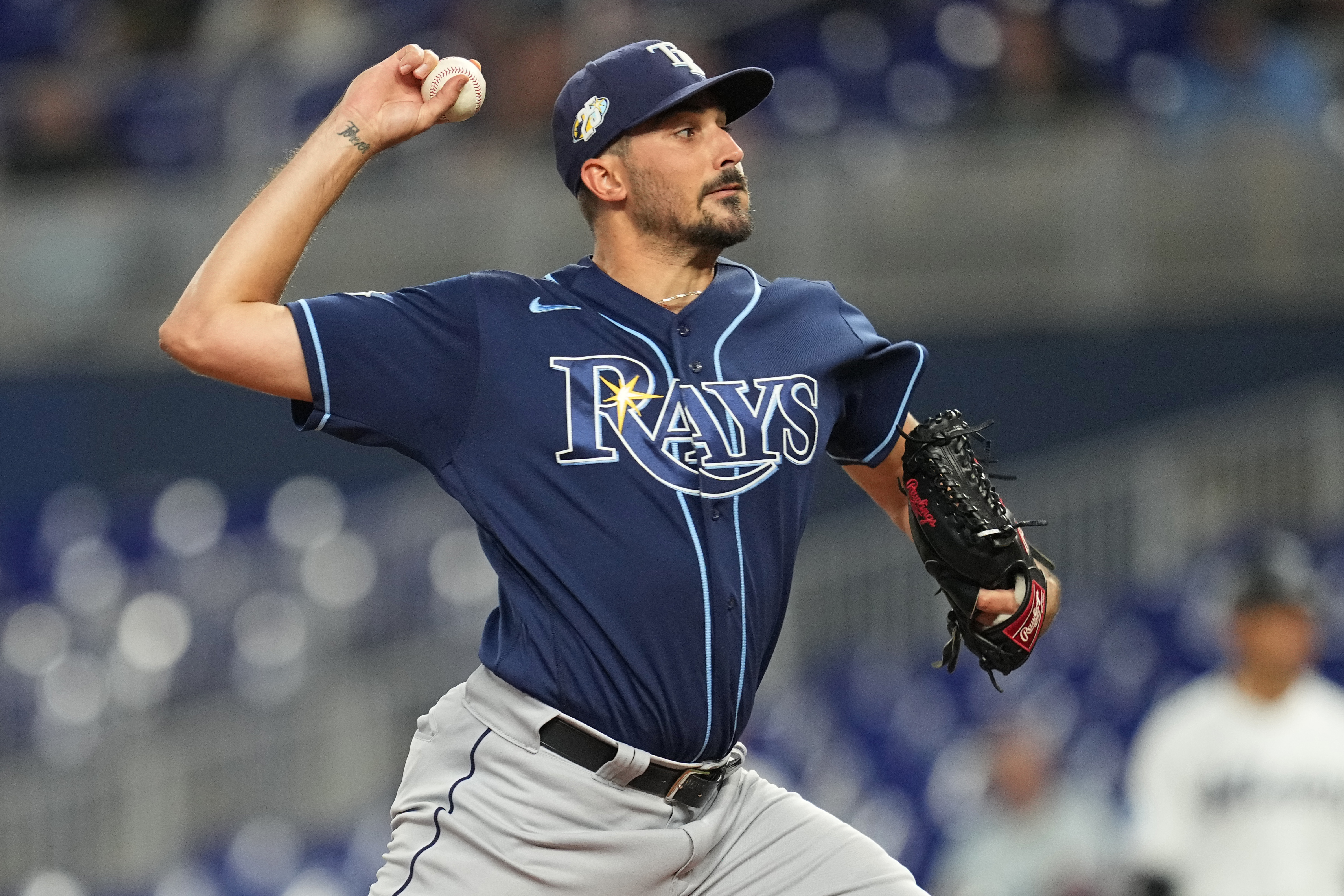 Tampa Bay Rays pitchers Shawn Armstrong, left, weaing a t-shirt to