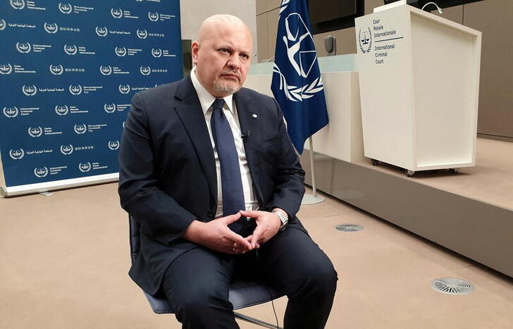 ICC Prosecutor Karim Khan poses during a Reuters interview at the ICC in The Hague