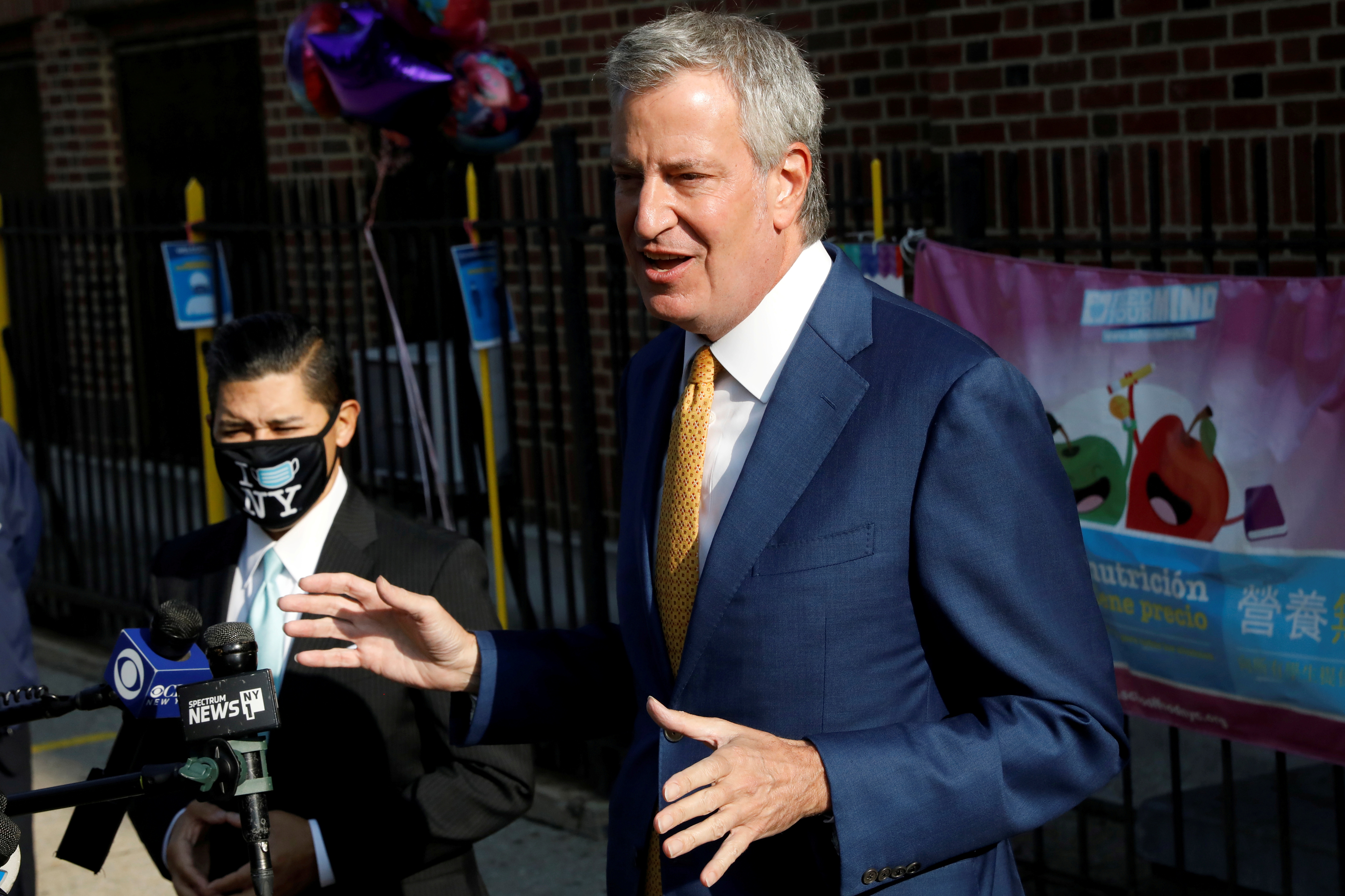 New York City Mayor Bill de Blasio, speaks during a news conference after greeting students for the first day of in-person pre-school following the outbreak of the coronavirus disease (COVID-19) in the Queens borough of New York City, U.S., September 21, 2020. REUTERS/Brendan McDermid 