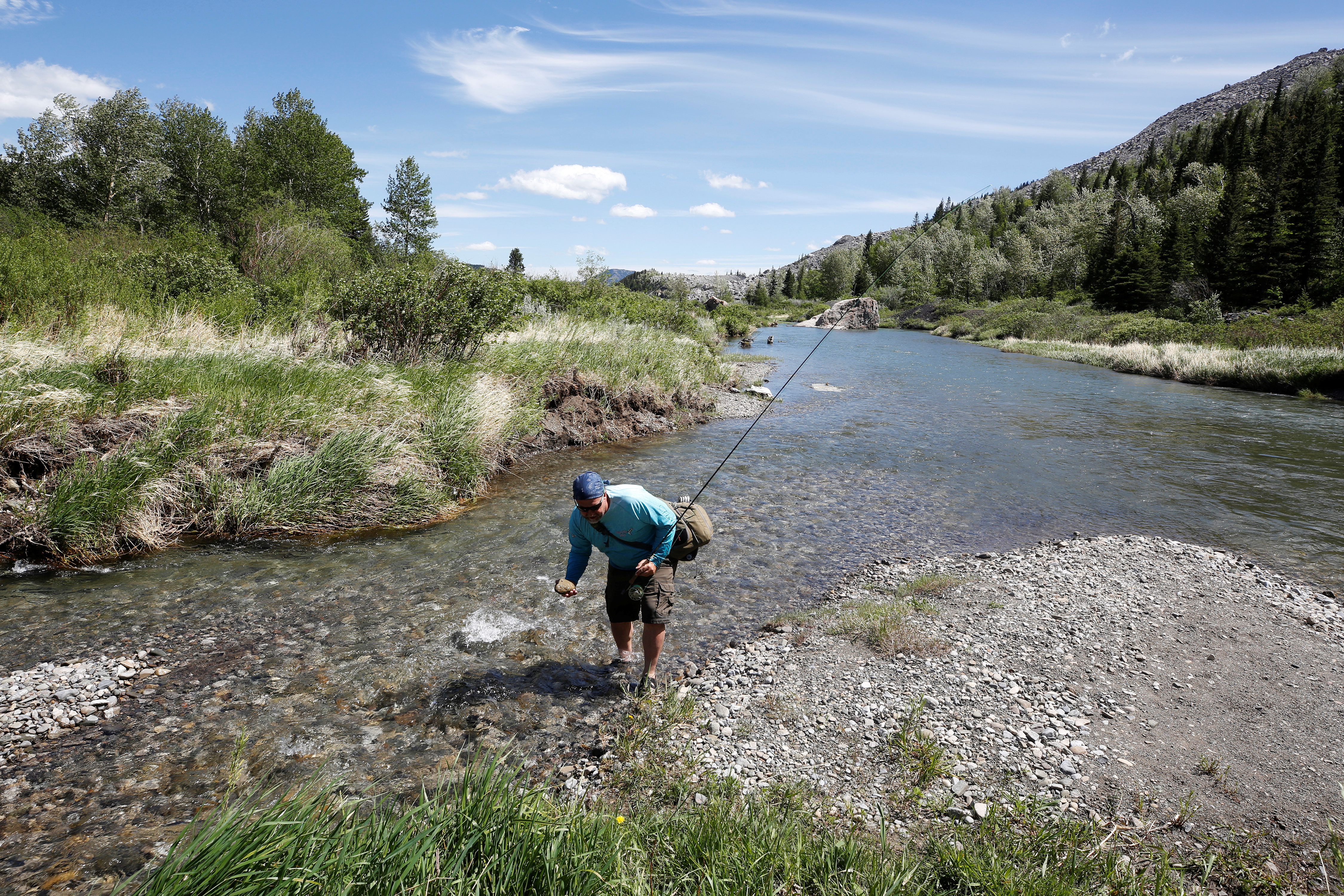 Fly fisherman Olson fishes the Crowsnest River near Blairmore
