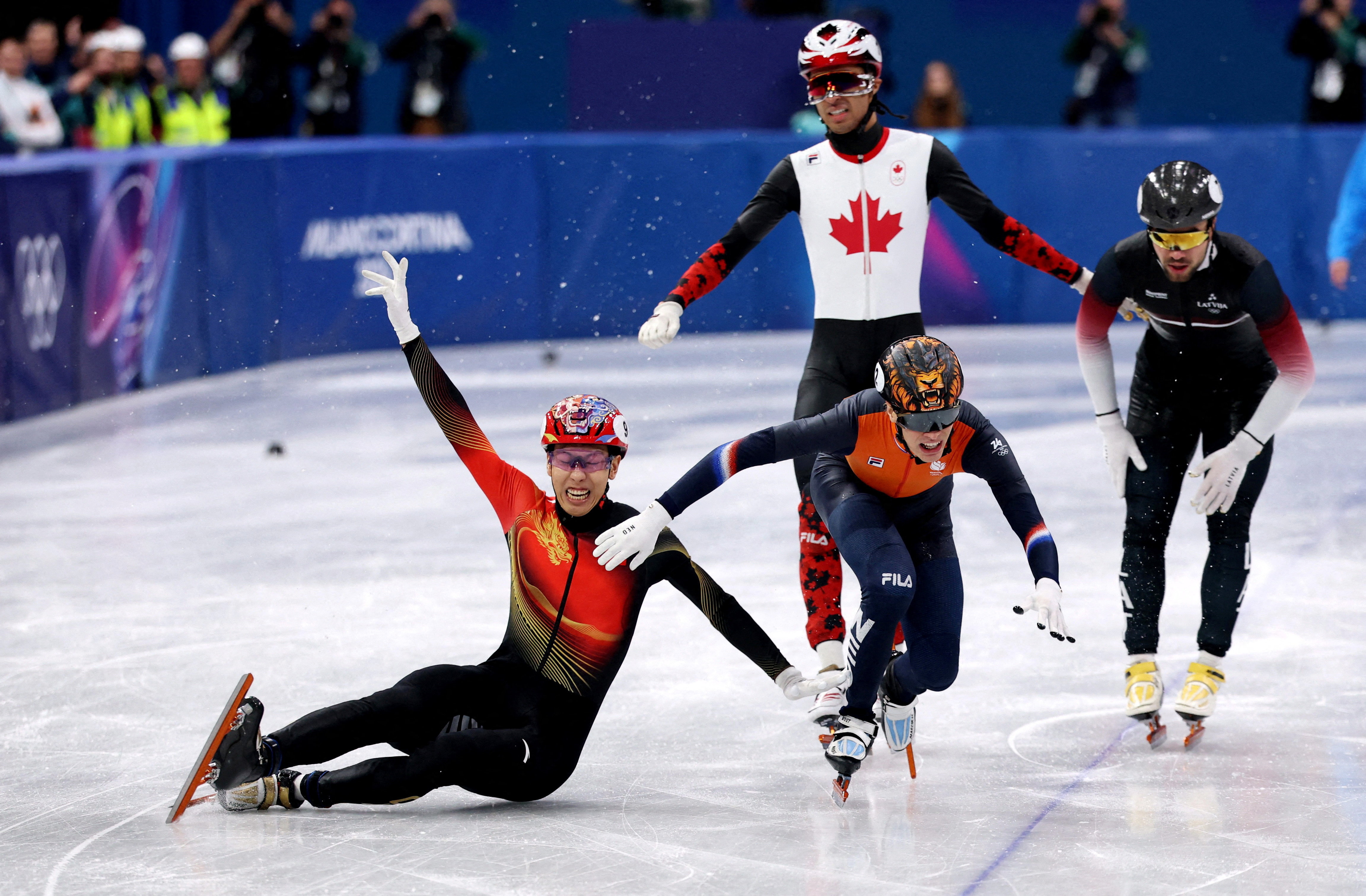 Golden moments at the Winter Olympics - February 13, 2026 | ロイター
