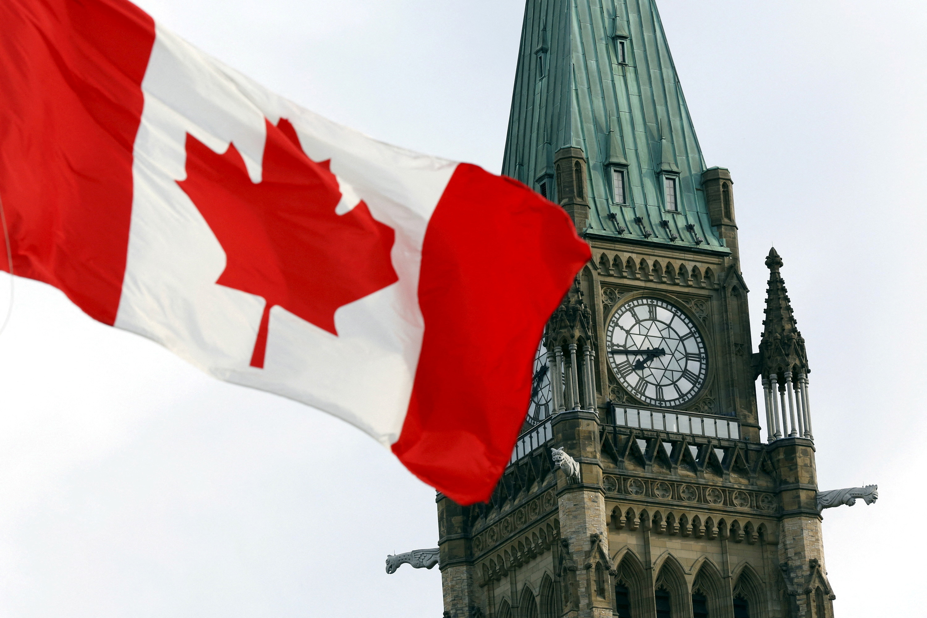 The Canadian flag flies on Parliament Hill in Ottawa
