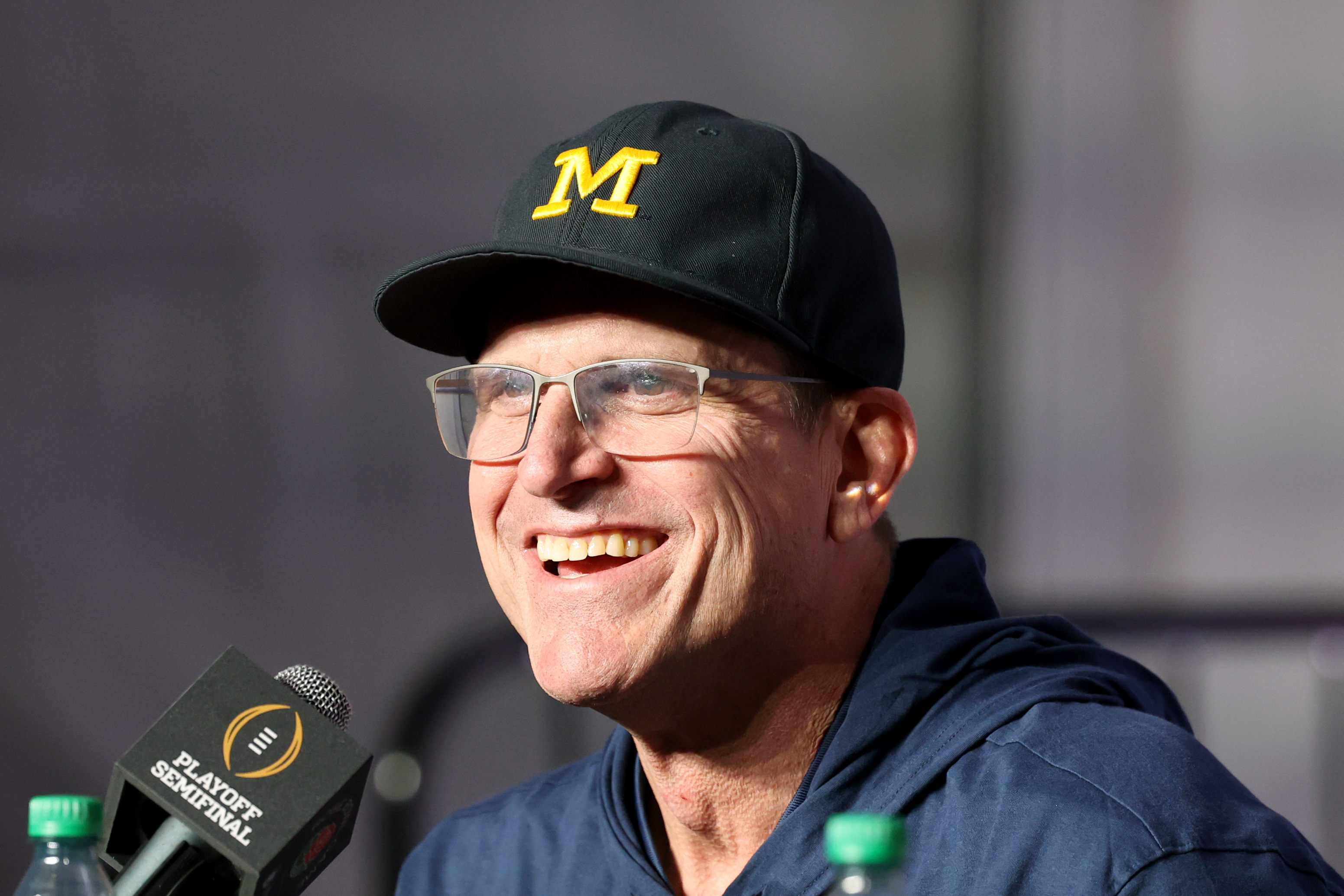 Jim Harbaugh favored to bolt Michigan for NFL | Reuters