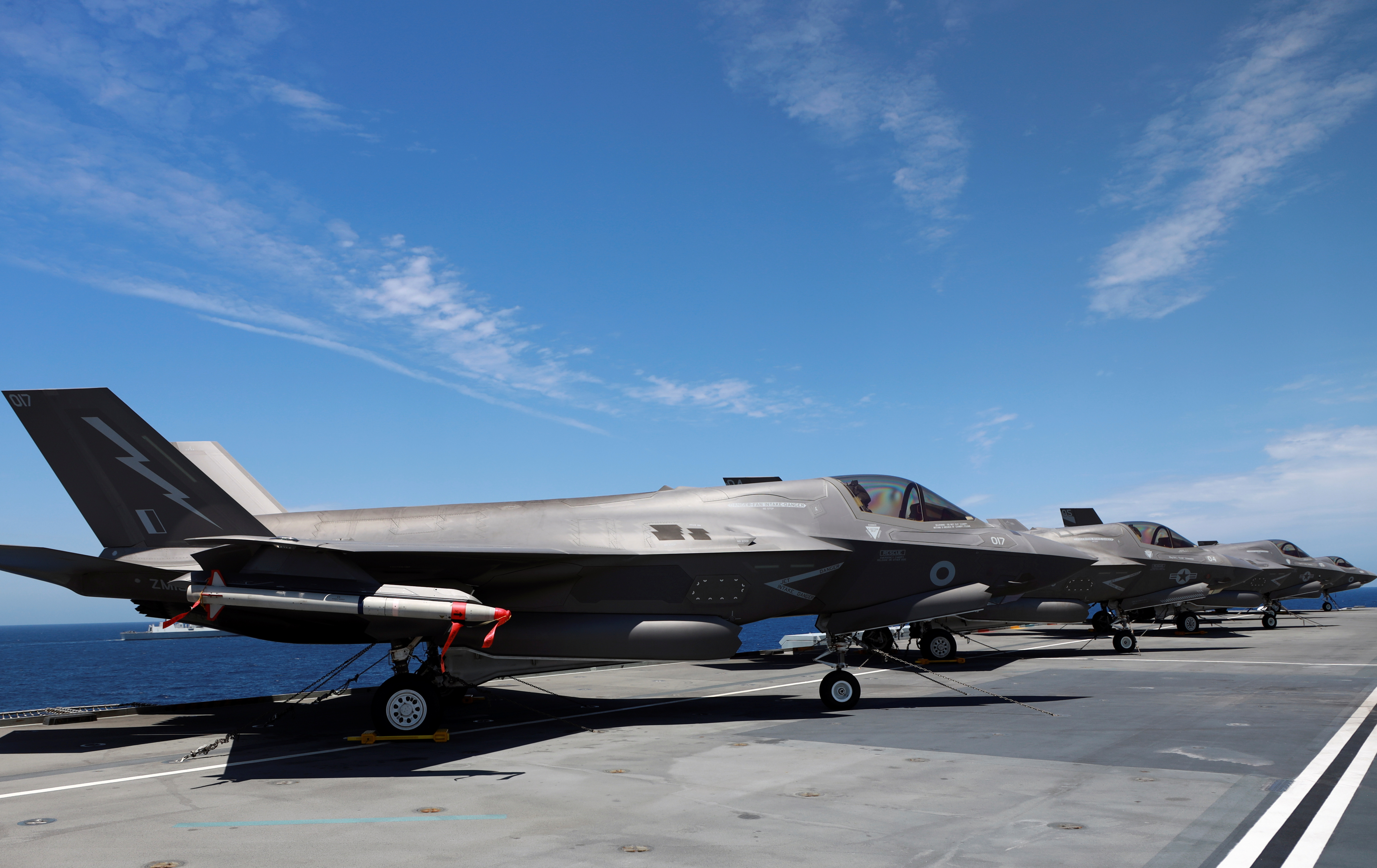 F-35B Lightning II aircrafts are seen on the deck of the HMS Queen Elizabeth aircraft carrier offshore Portugal