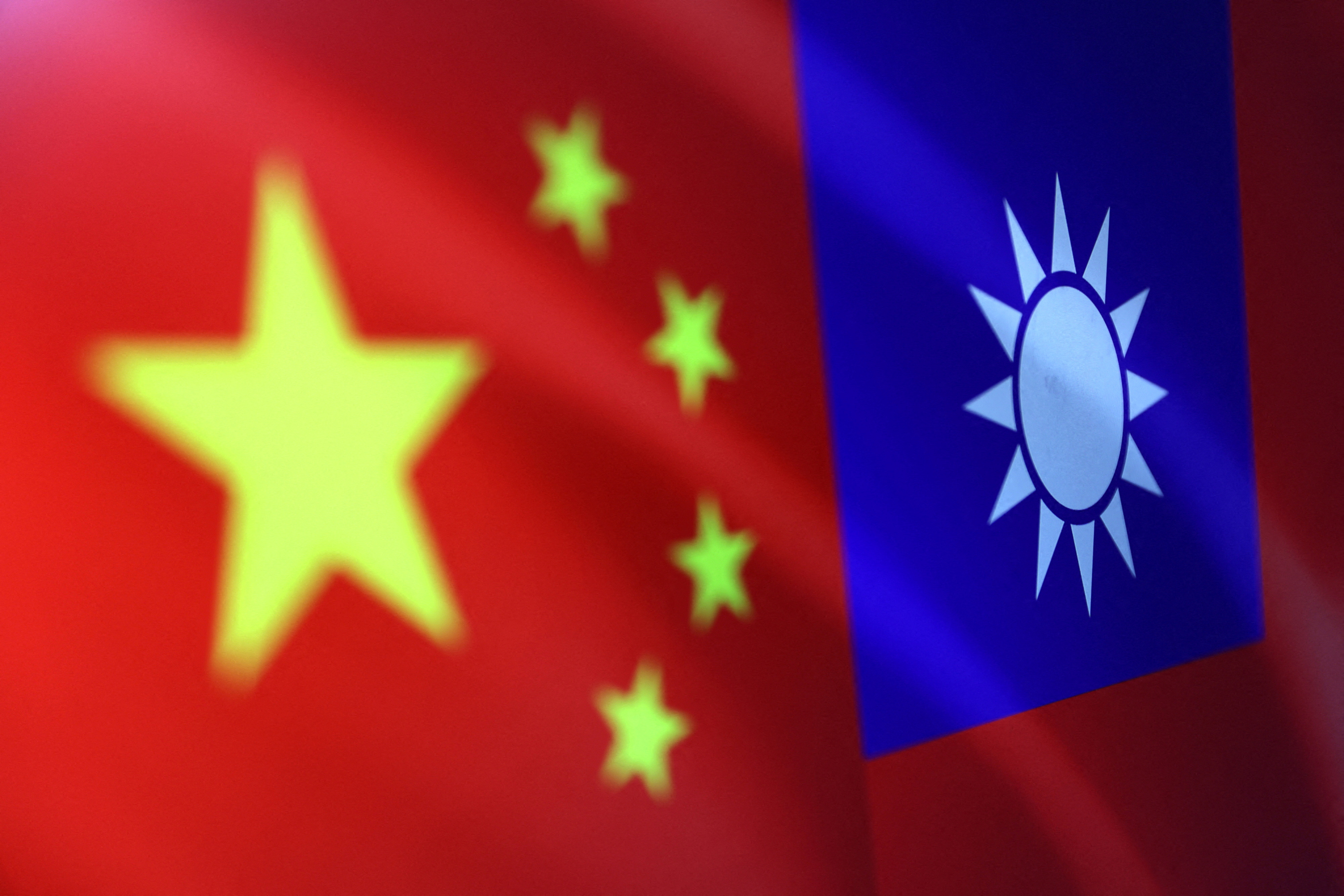 Illustration shows Chinese and Taiwanese flags