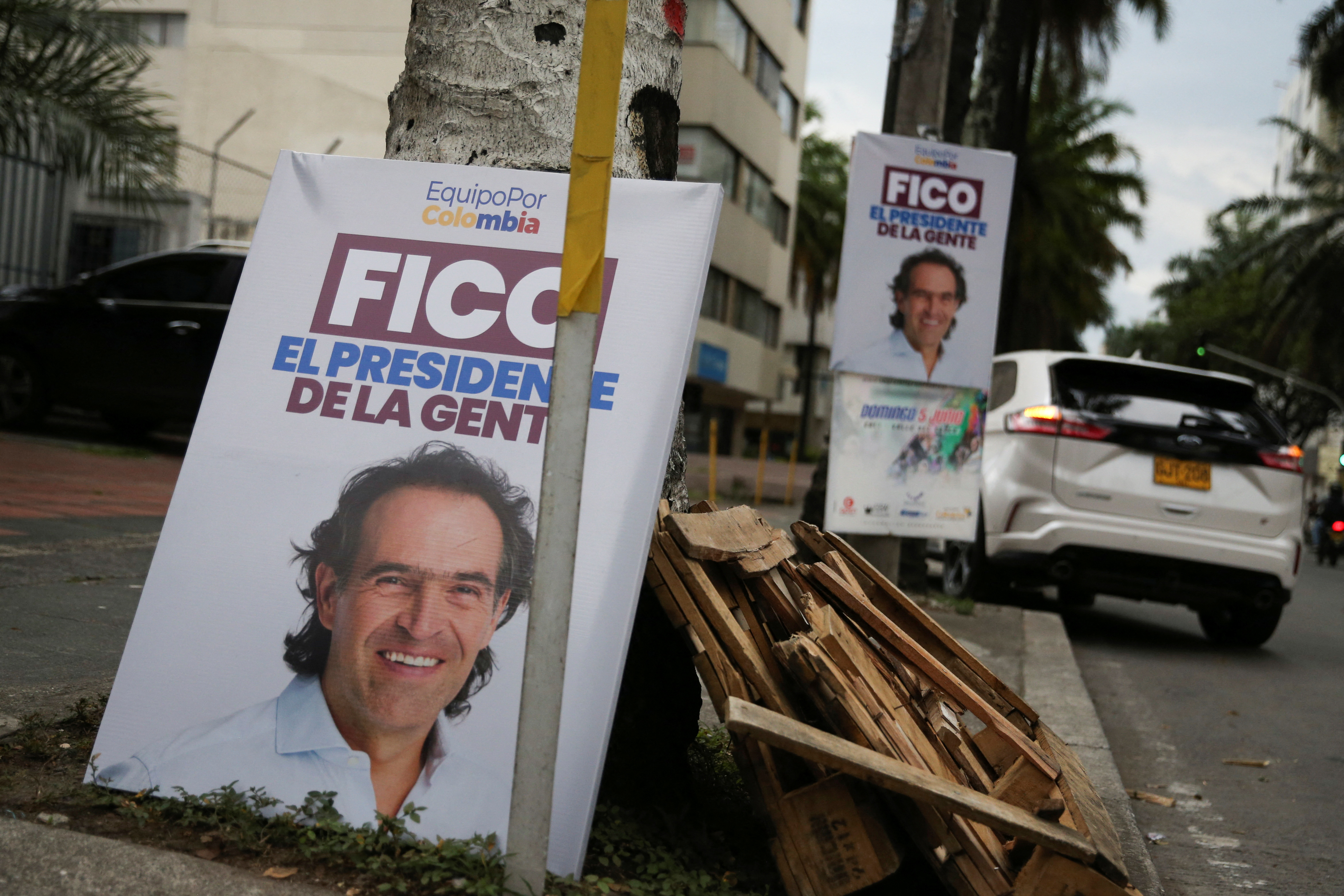 A banner with the image of Colombian centre-right presidential candidate Federico Gutierrez of the government's coalition Team for Colombia is pictured one day before the first round of elections in Cali