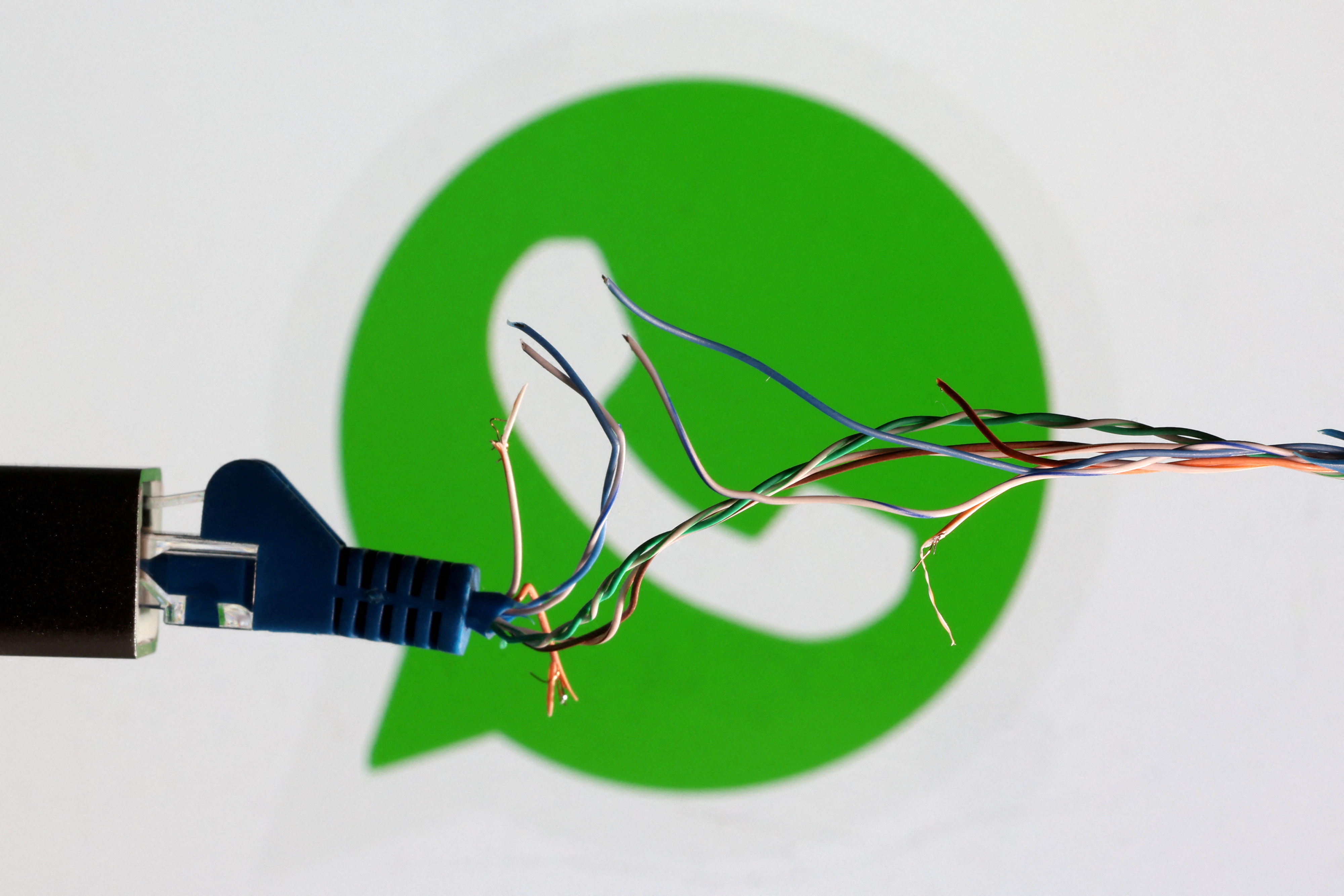 Illustration shows broken Ethernet cable and Whatsapp logo