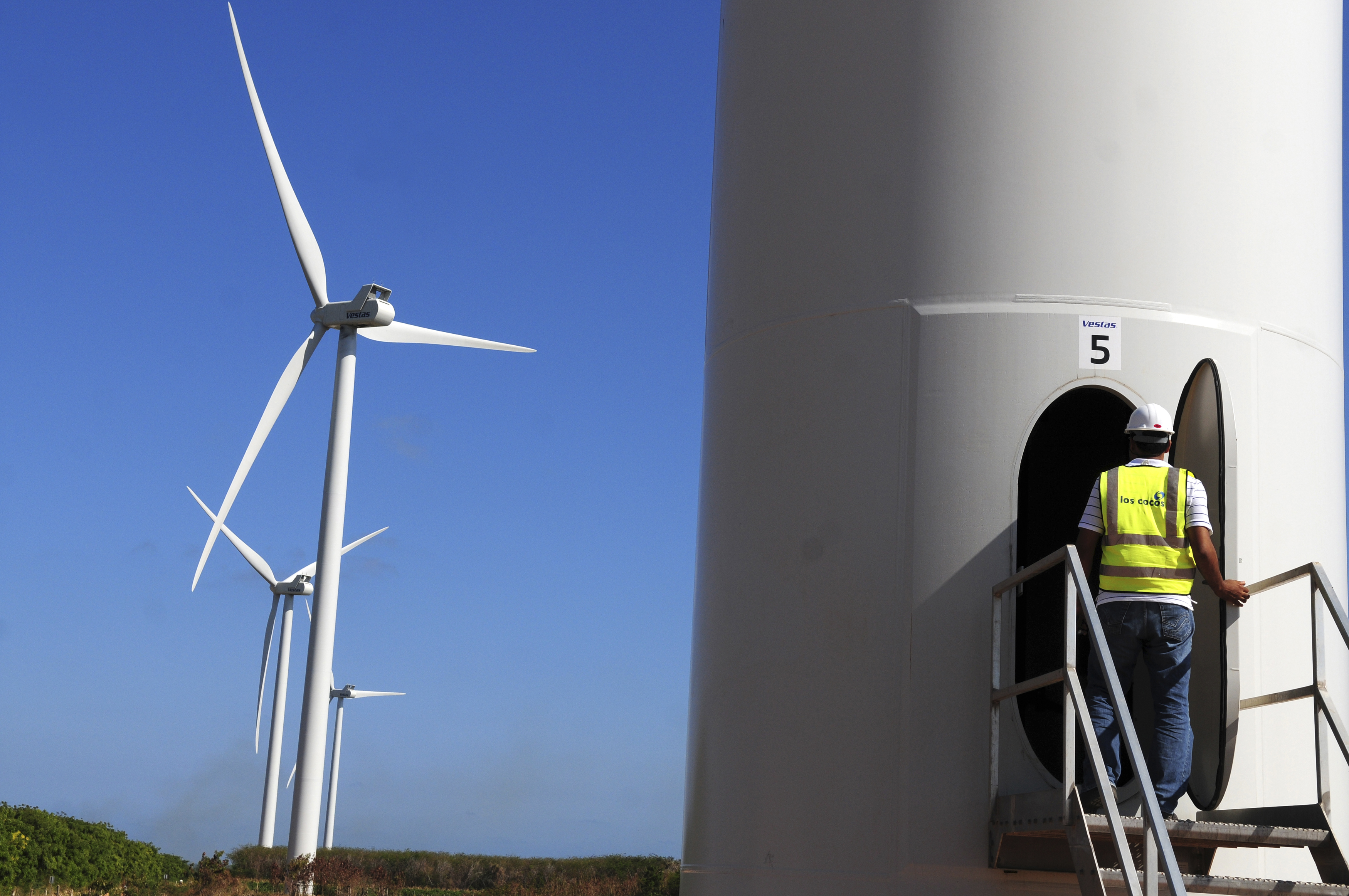 An employee works at the Los Cocos wind farm in Juancho Pedernales