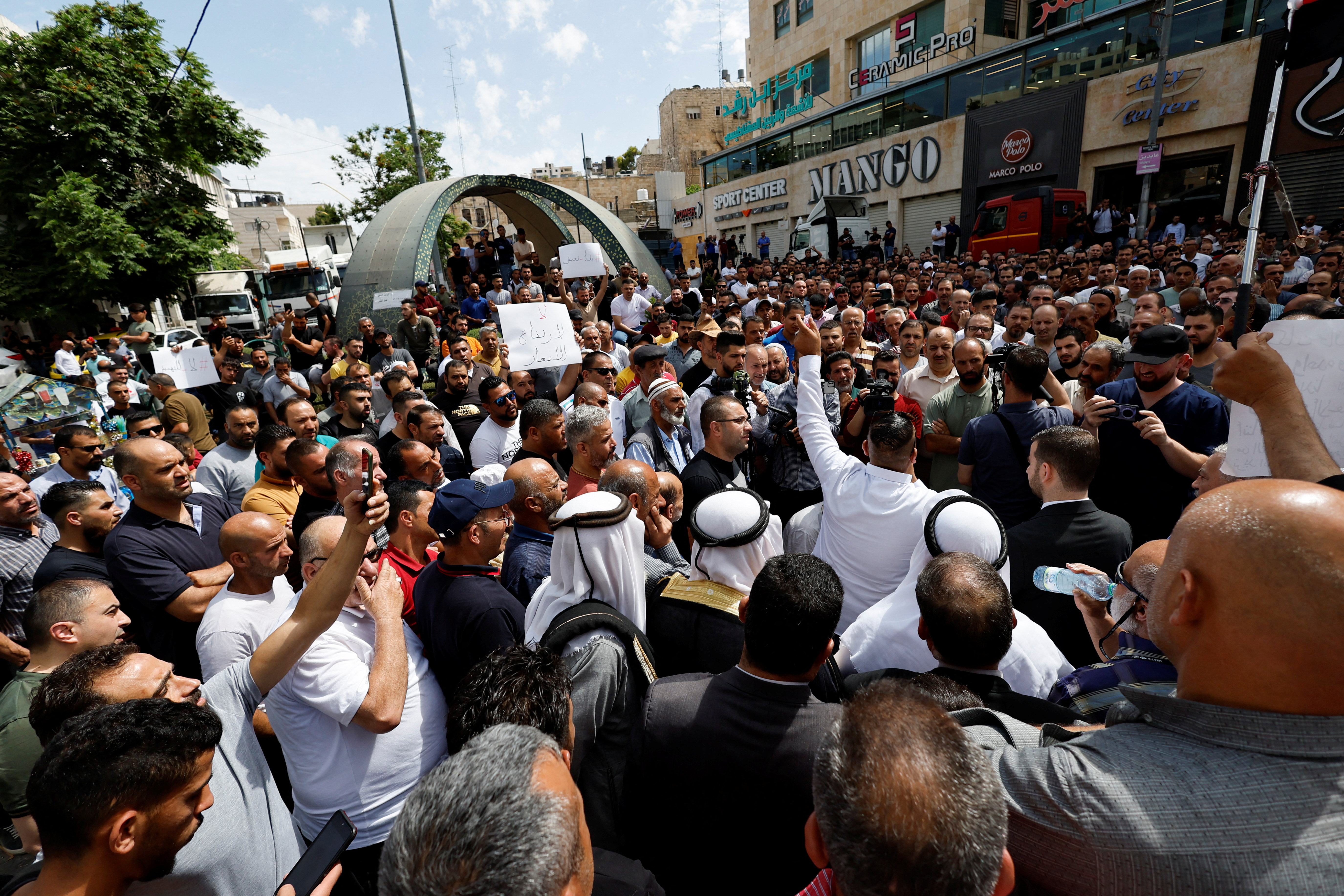 Palestinians protest against rising of prices in the West Bank