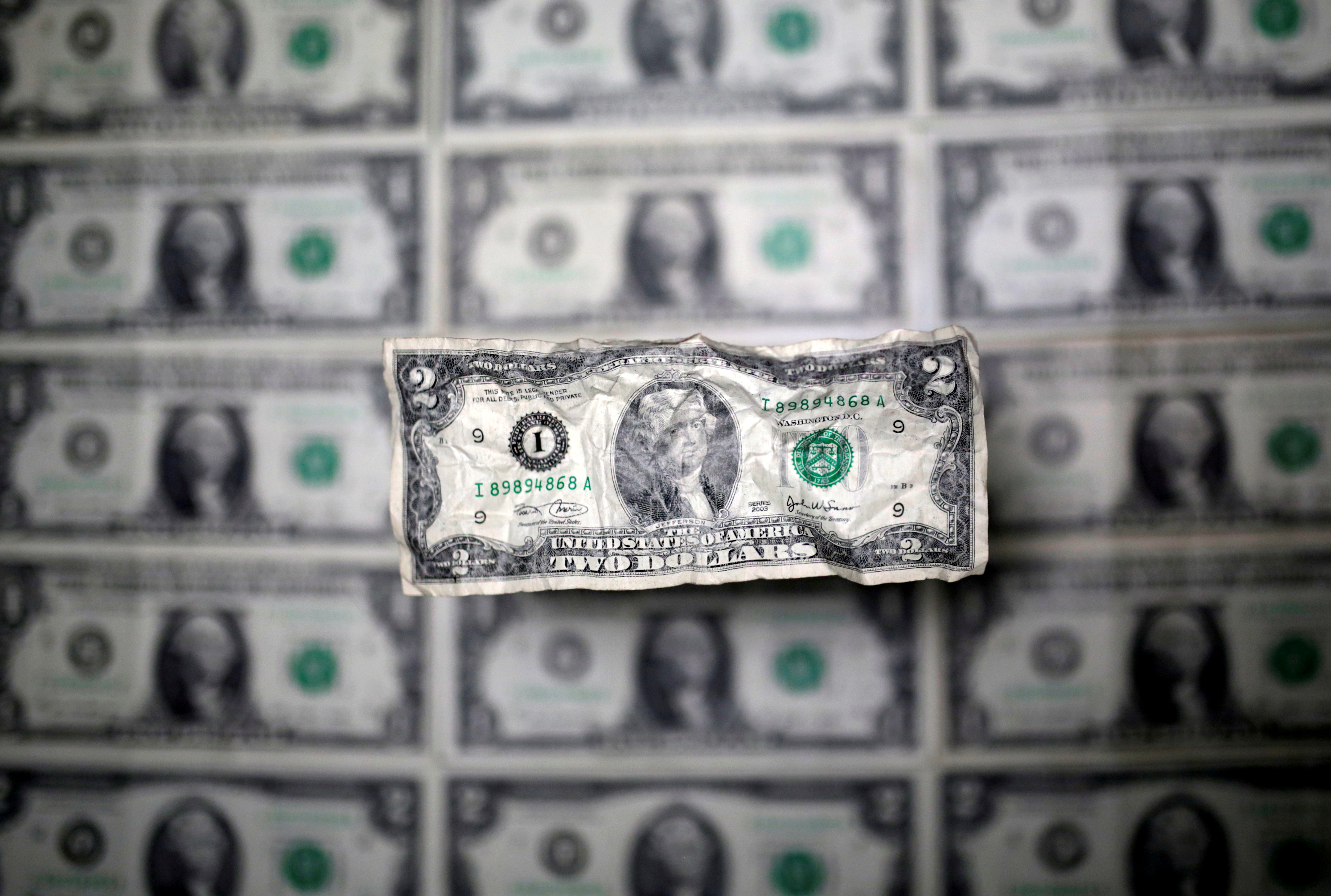 U.S. dollar banknote is seen in this picture illustration