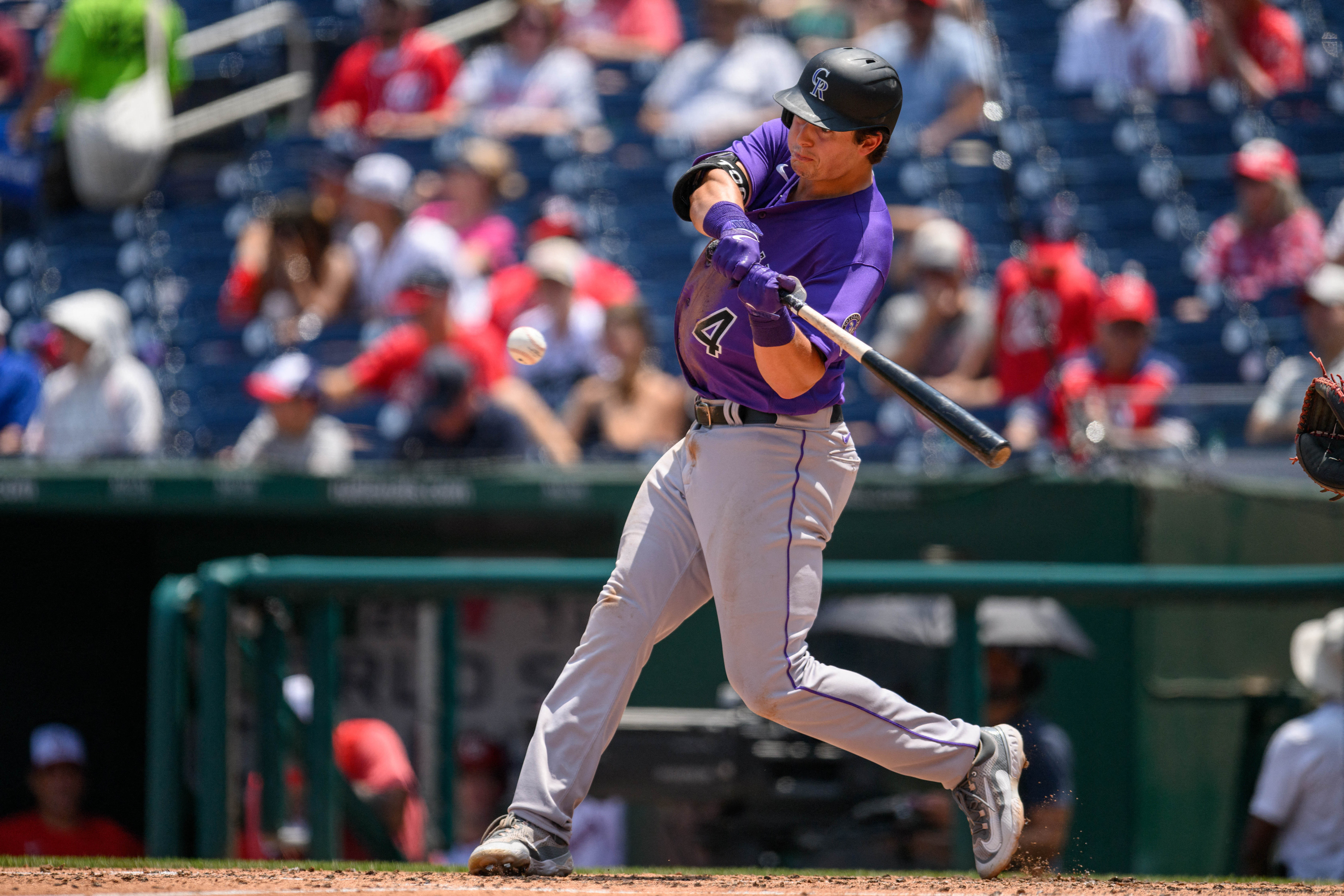 Nationals rally with 4-run ninth to edge Rockies