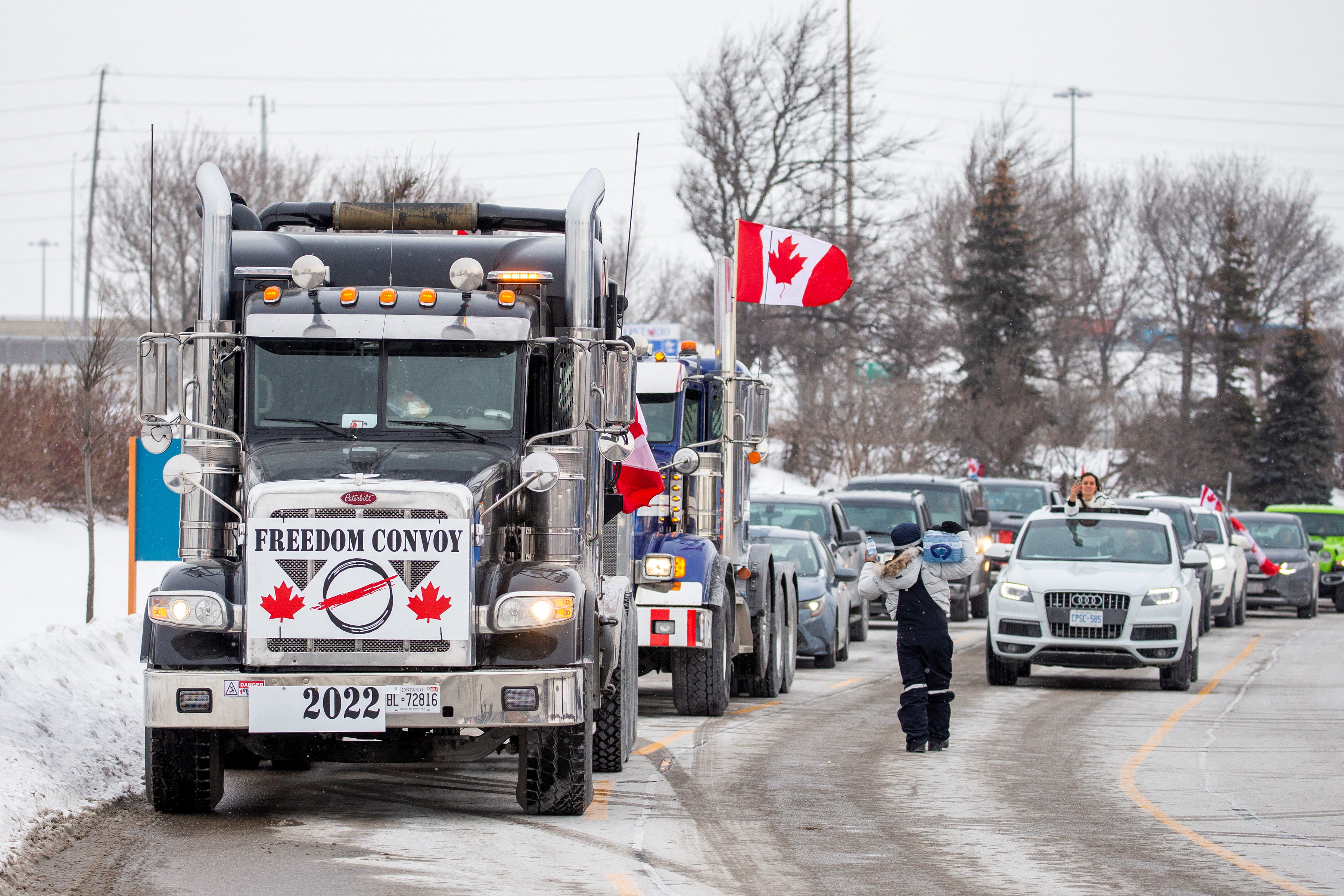 Anti-vaccine Canada truckers roll toward Ottawa, praised by Tesla's Musk |  Reuters
