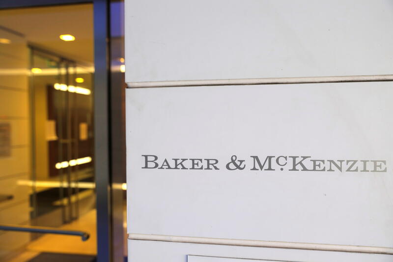 Signage is seen outside of the law firm Baker McKenzie at their legal offices in Washington, D.C.