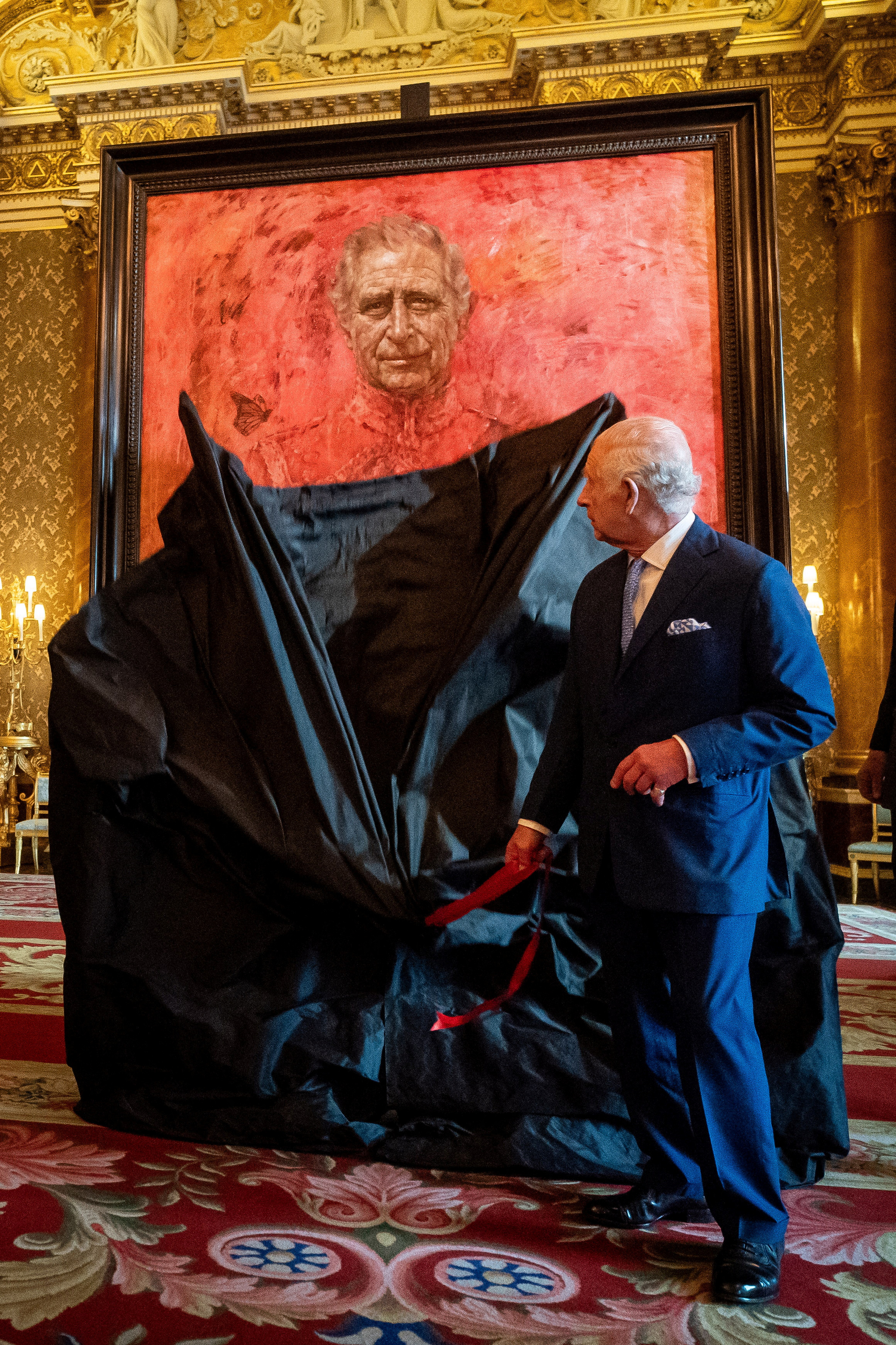 King Charles unveils his first portrait since coronation | Reuters