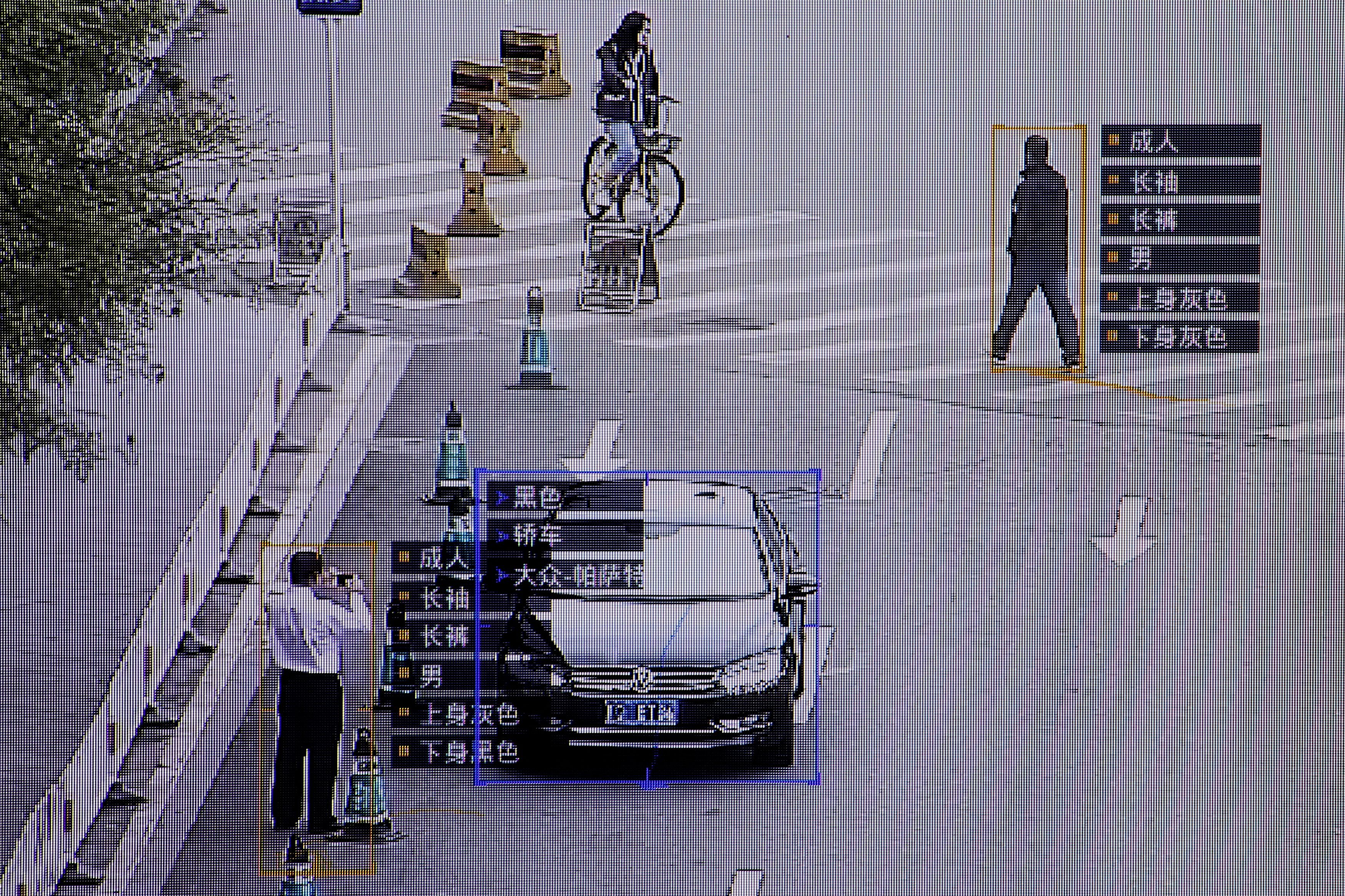 SenseTime surveillance software, which identifies details about people and vehicles, runs during a demonstration at the company's office in Beijing