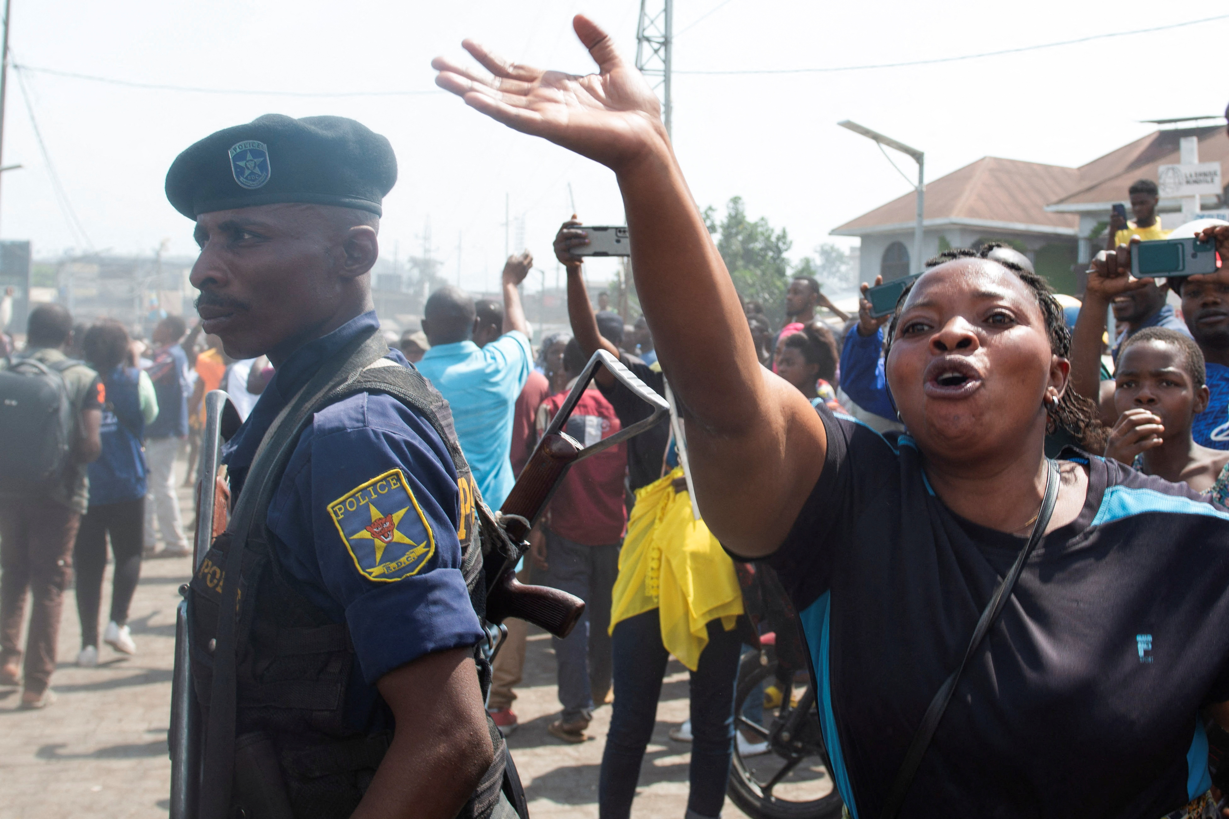 A Congolese woman reacts during a protest demanding the body of a Congolese soldier shot dead in Rwanda