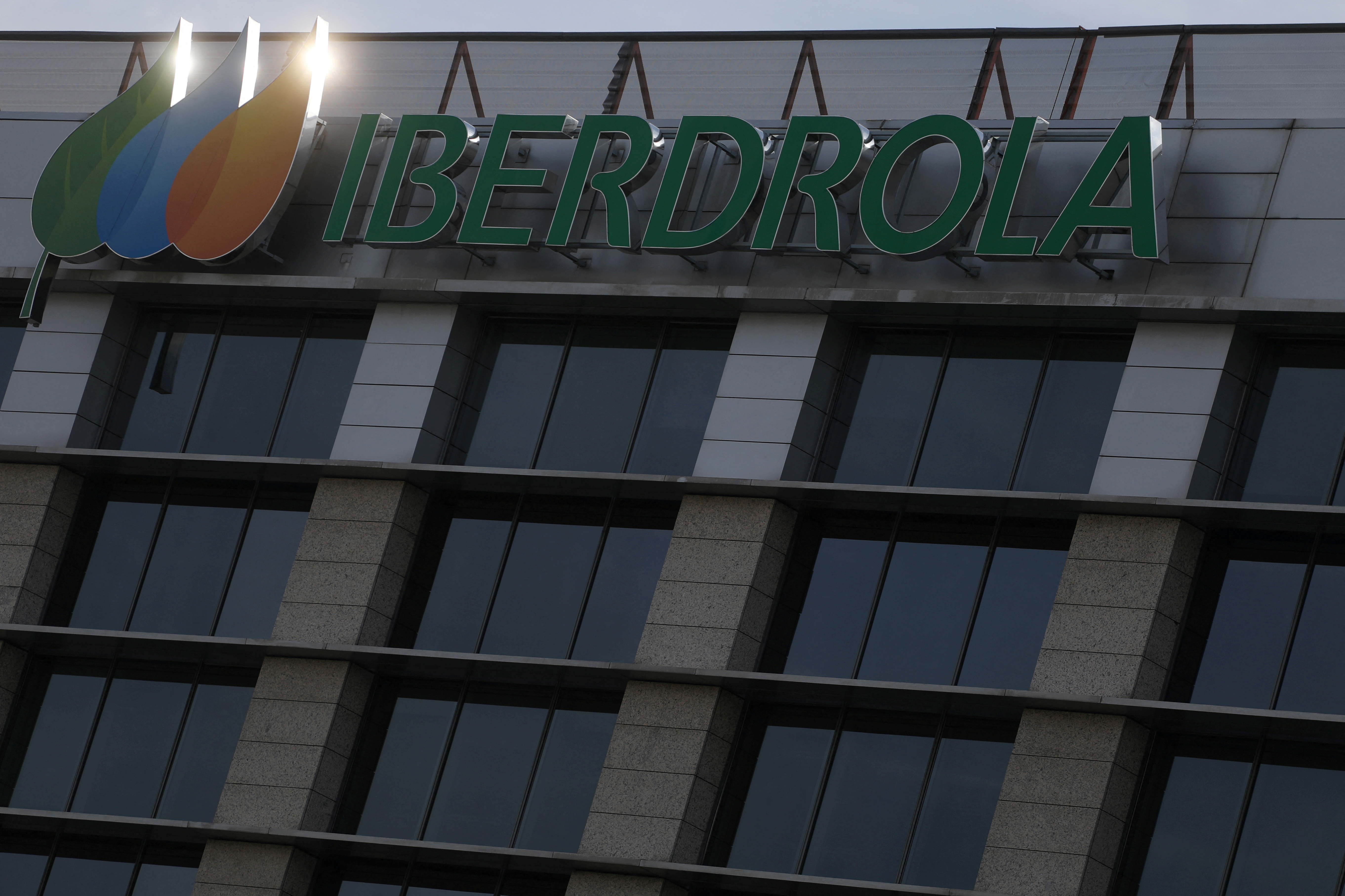 The logo of Spanish utility company Iberdrola is seen outside its headquarters in Madrid