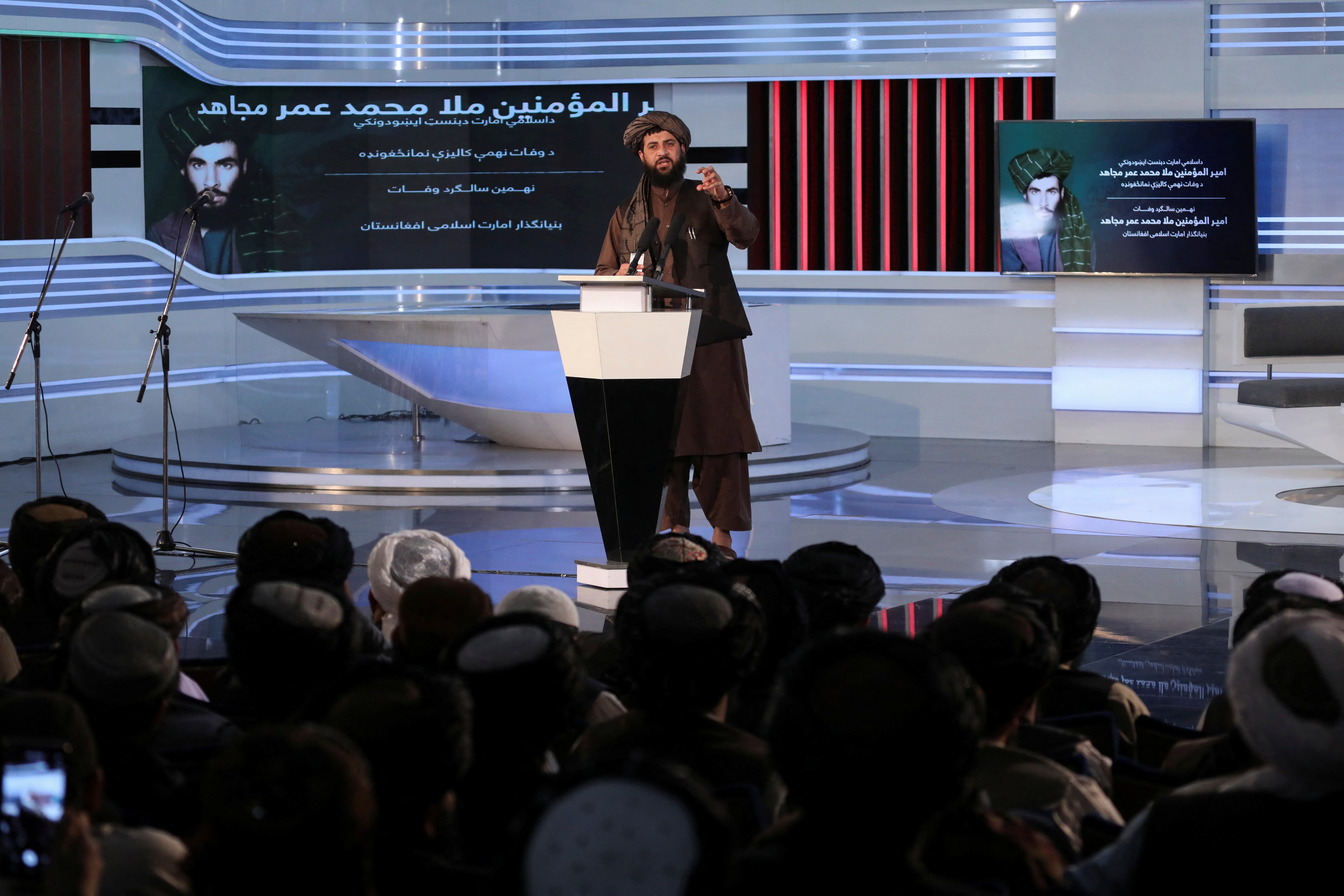Taliban spokesman Zabihullah Mujahid speaks during the death anniversary of Mullah Mohammad Omar, The late leader and founder of the Taliban in Kabul