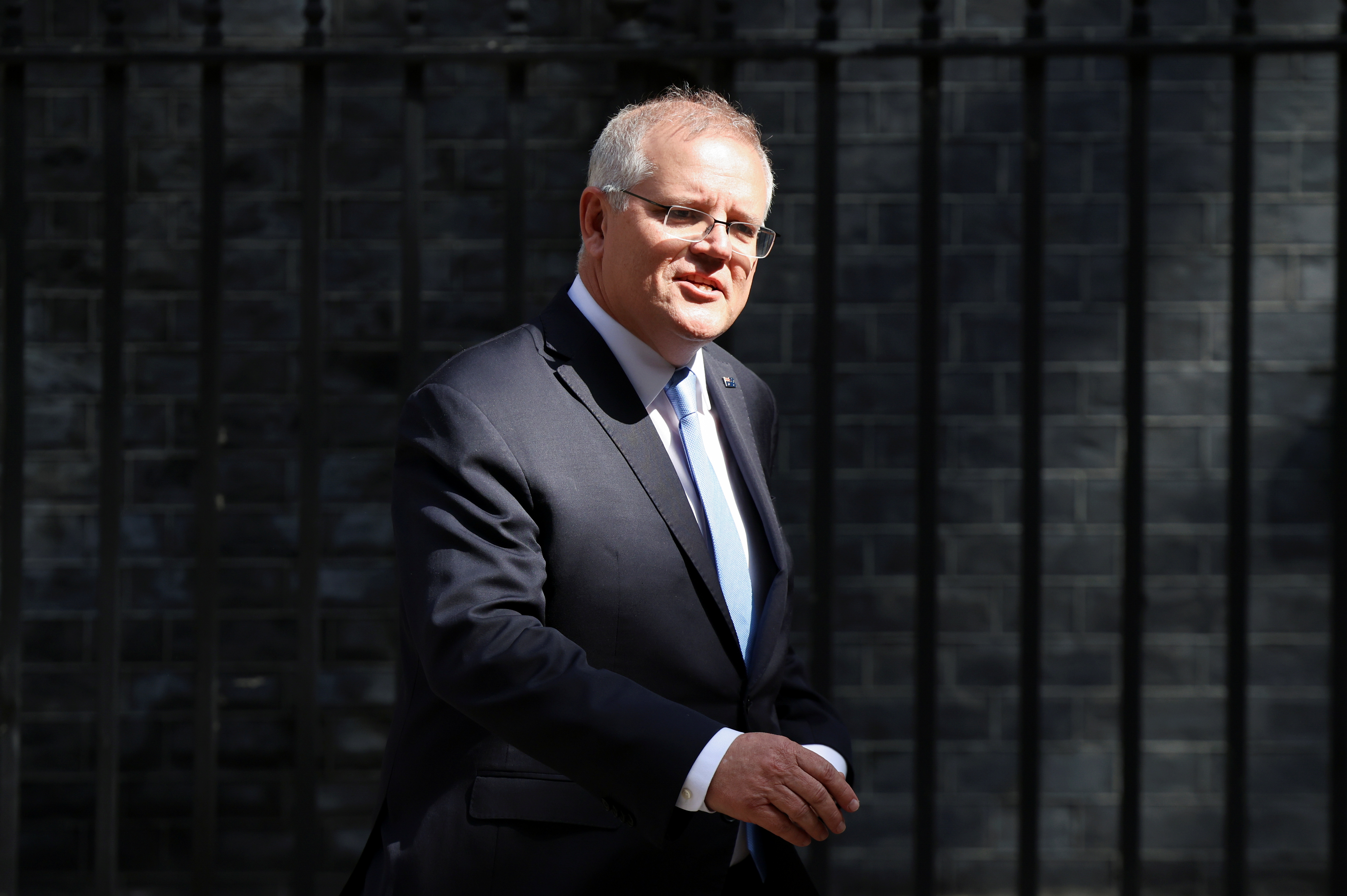 Australian Prime Minister Scott Morrison leaves Downing Street in London, Britain, June 15, 2021. REUTERS/Henry Nicholls