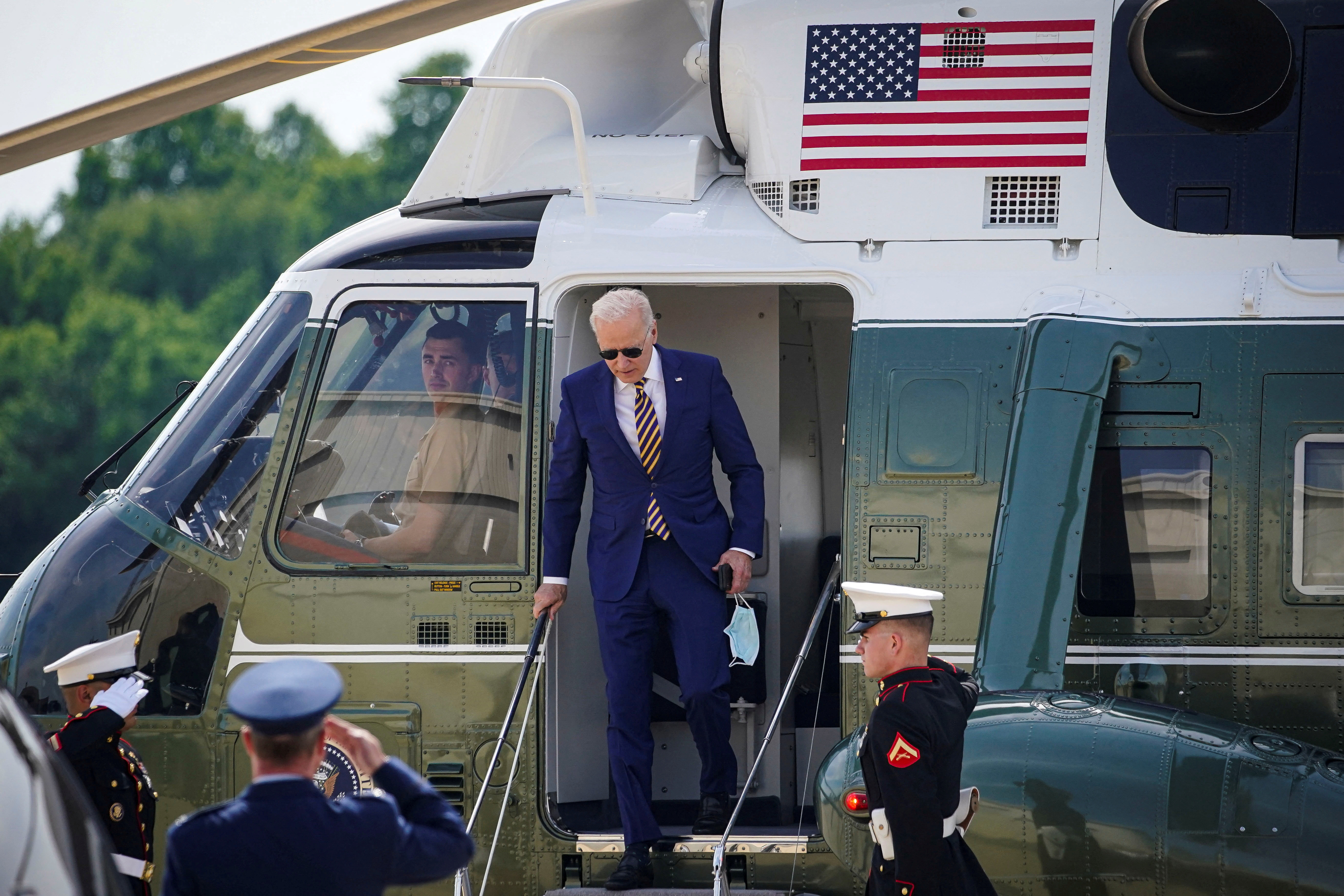 U.S. President Joe Biden arrives on Marine One for a weekend trip to his home in Wilmington at Delaware Air National Guard Base