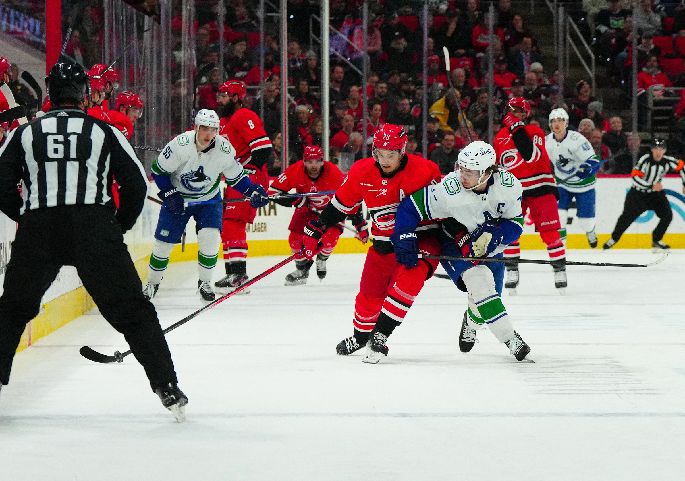 Elias Lindholm Helps Canucks Down Hurricanes In Team Debut | Reuters