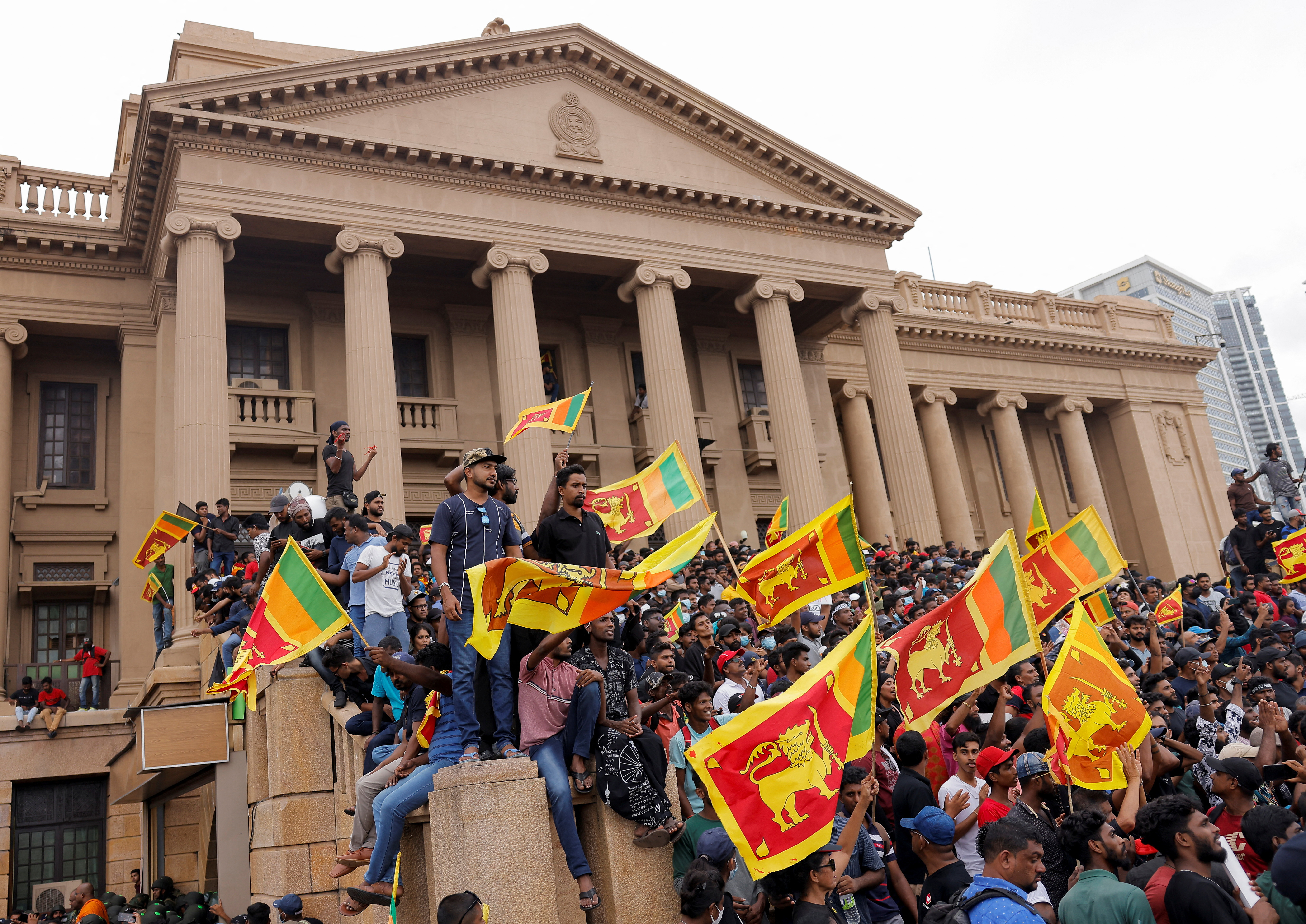 Demonstrators protest at the Presidential Secretariat, after President Gotabaya Rajapaksa fled, in Colombo