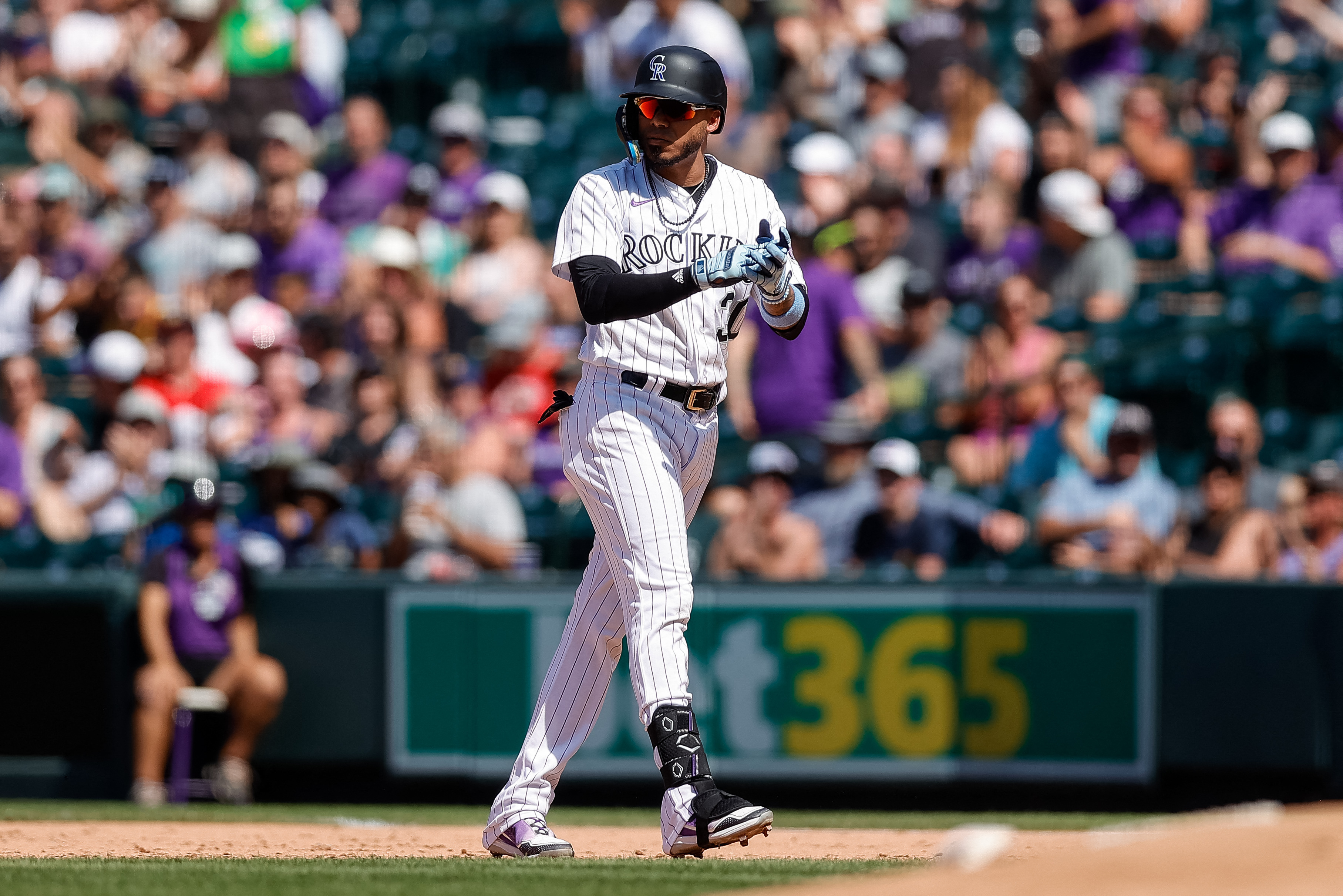 Chicago White Sox third baseman Yoan Moncada (10) swings at the pitch in an  MLB baseball game against the Colorado Rockies, Sunday, Aug. 20, 2023. The  White Sox defeated the Rockies 10-5