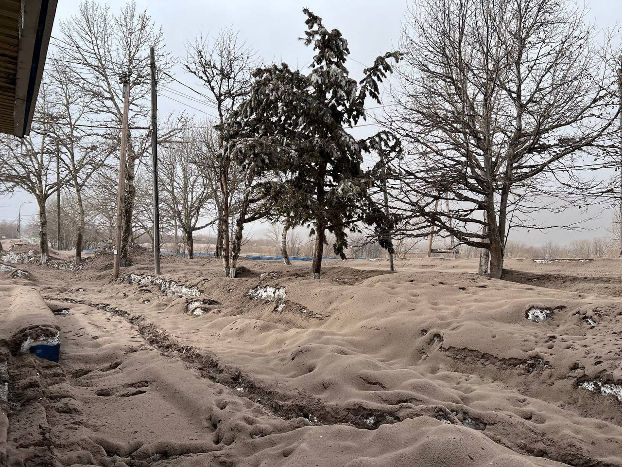 A view shows a street covered in volcanic dust following the eruption of Shiveluch volcano in the settlement of Klyuchi