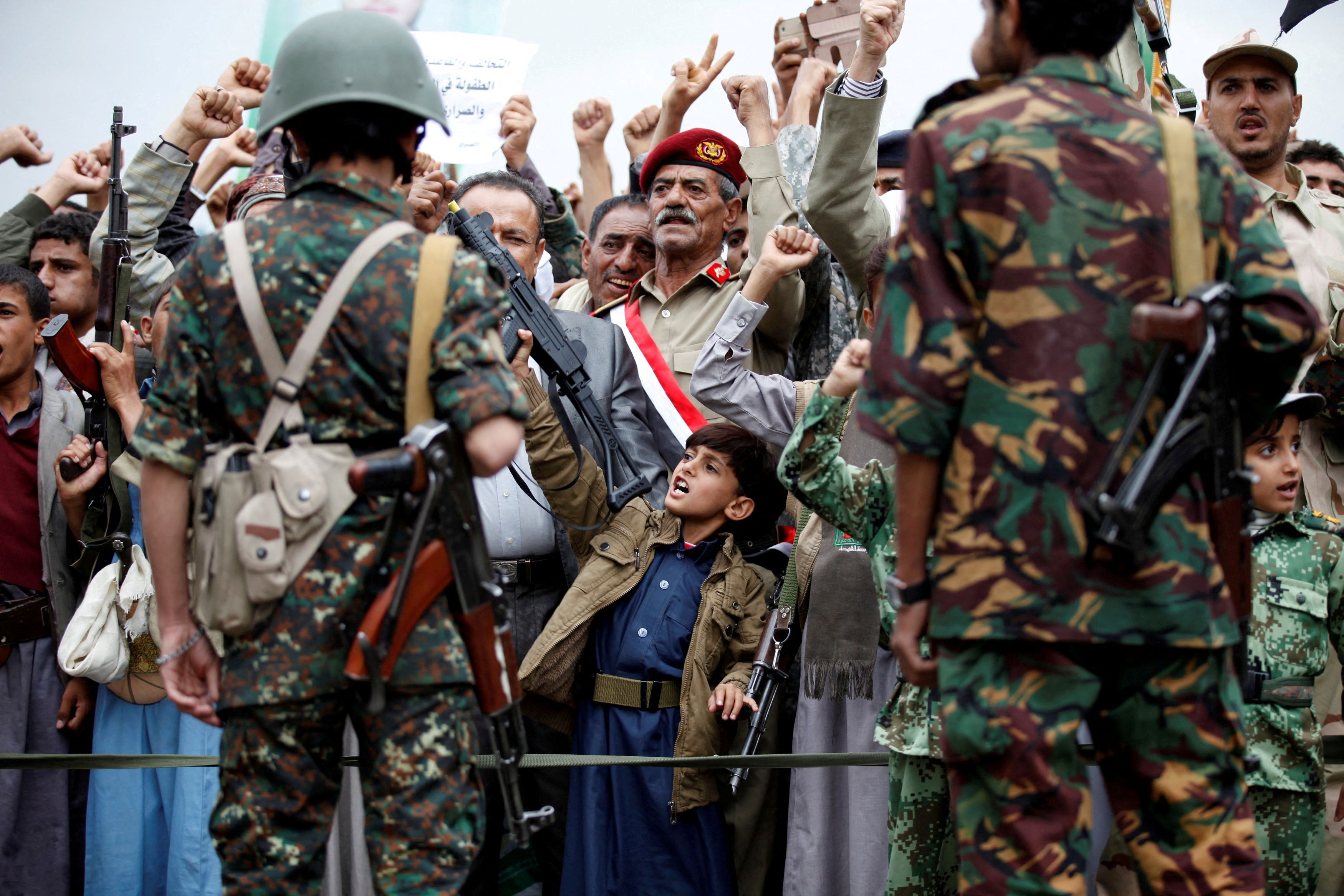 Supporters of the Houthi movement take part in a demonstration, in Sanaa