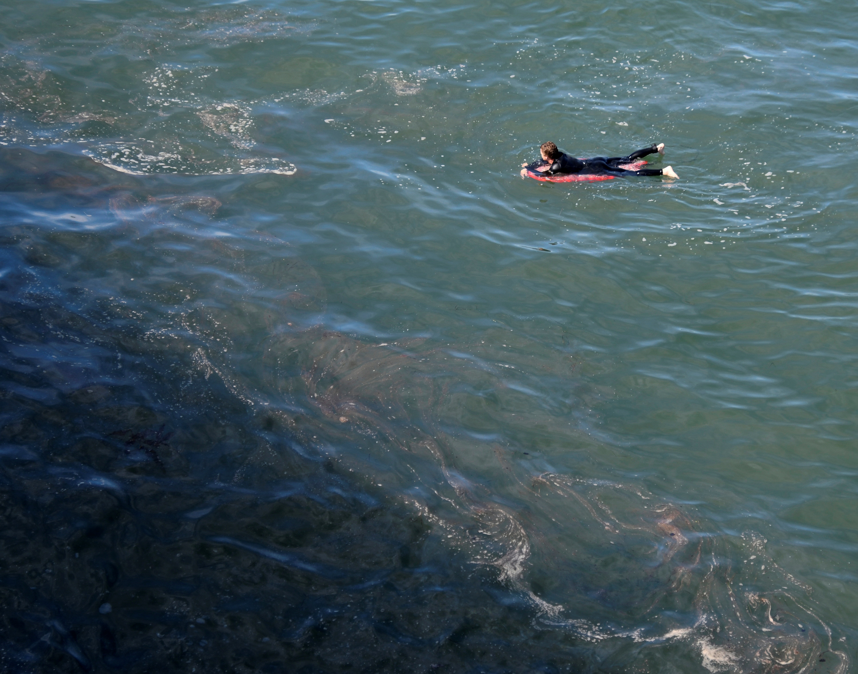 Oil spill off the coast of California has come ashore in Huntington Beach