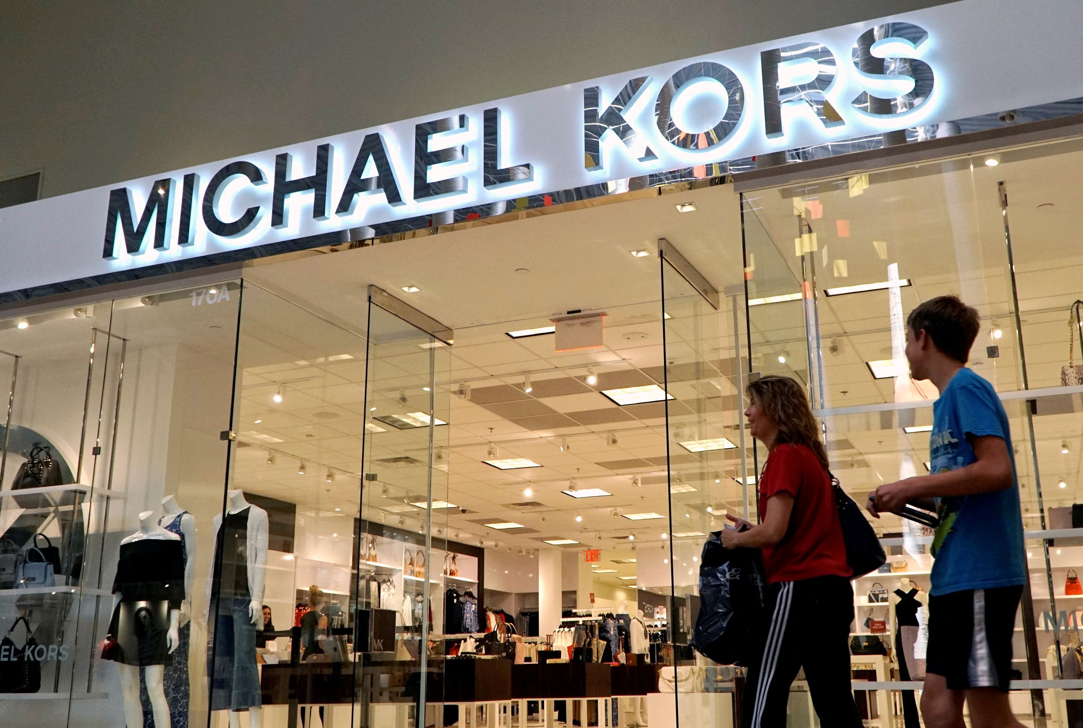 Versace, Michael Kors parent company shares soar on earnings beat