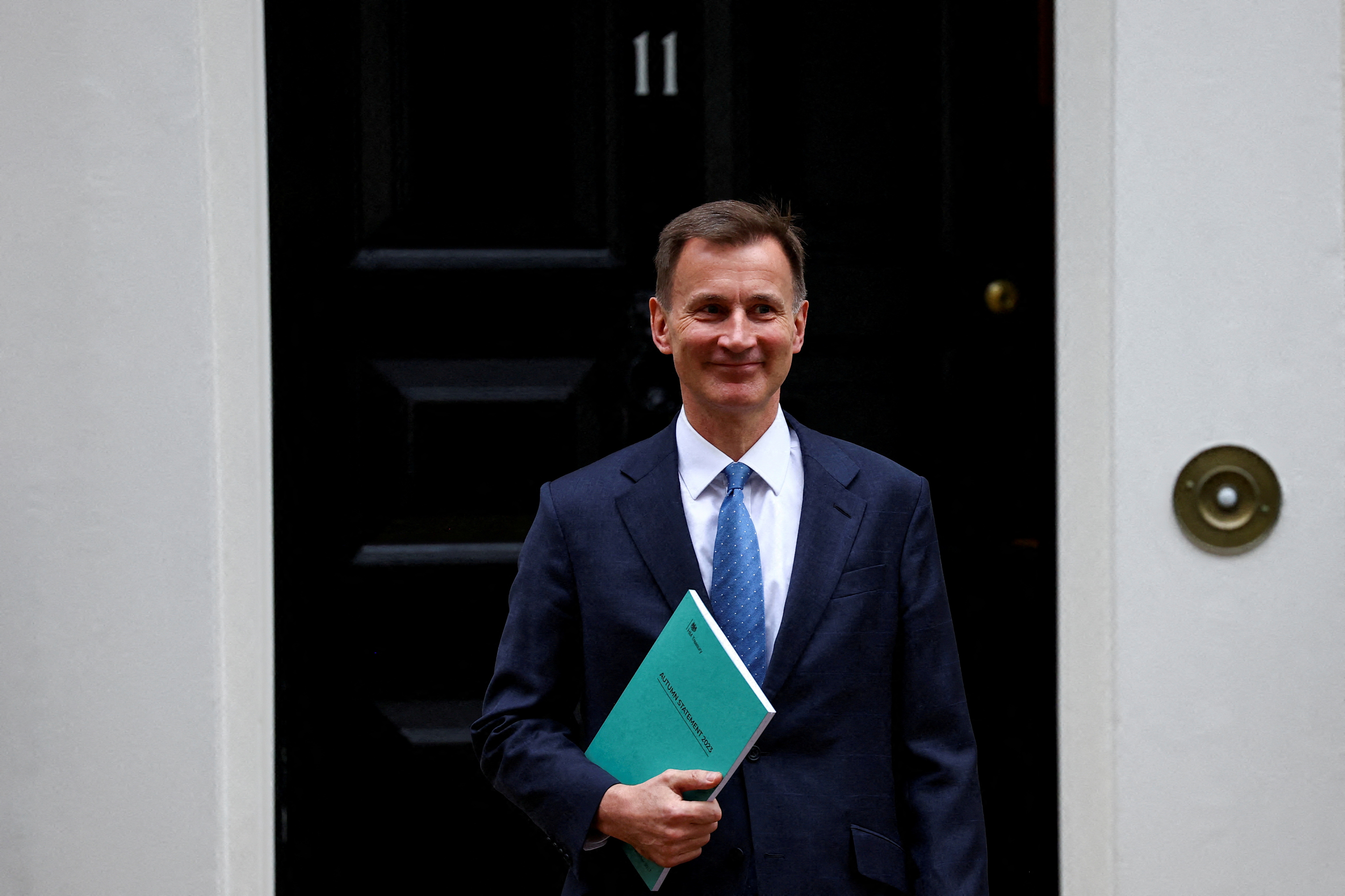 UK's Hunt plays down talk of big tax cuts in pre-election budget