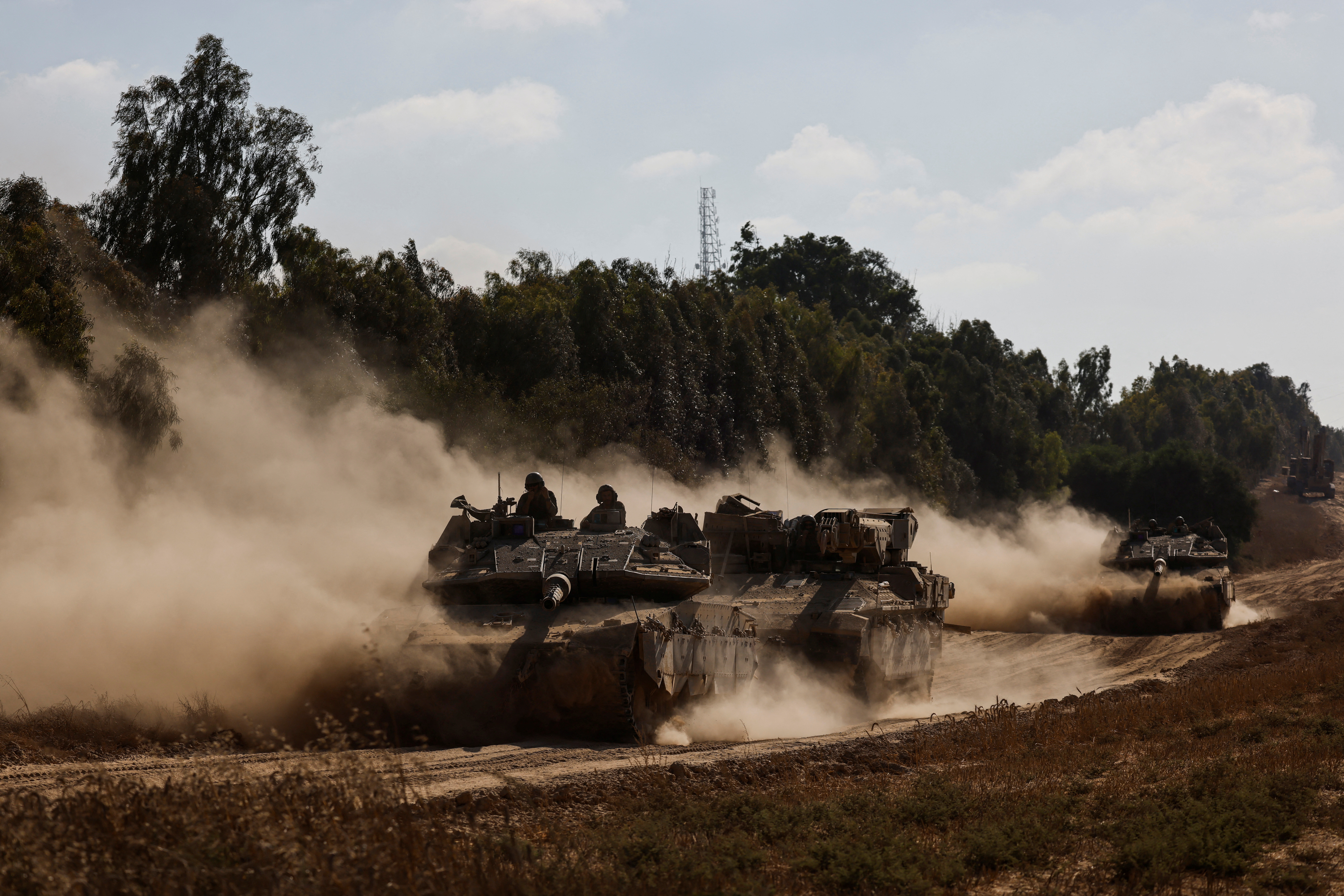 A convoy manoeuvres near the Israel-Gaza border