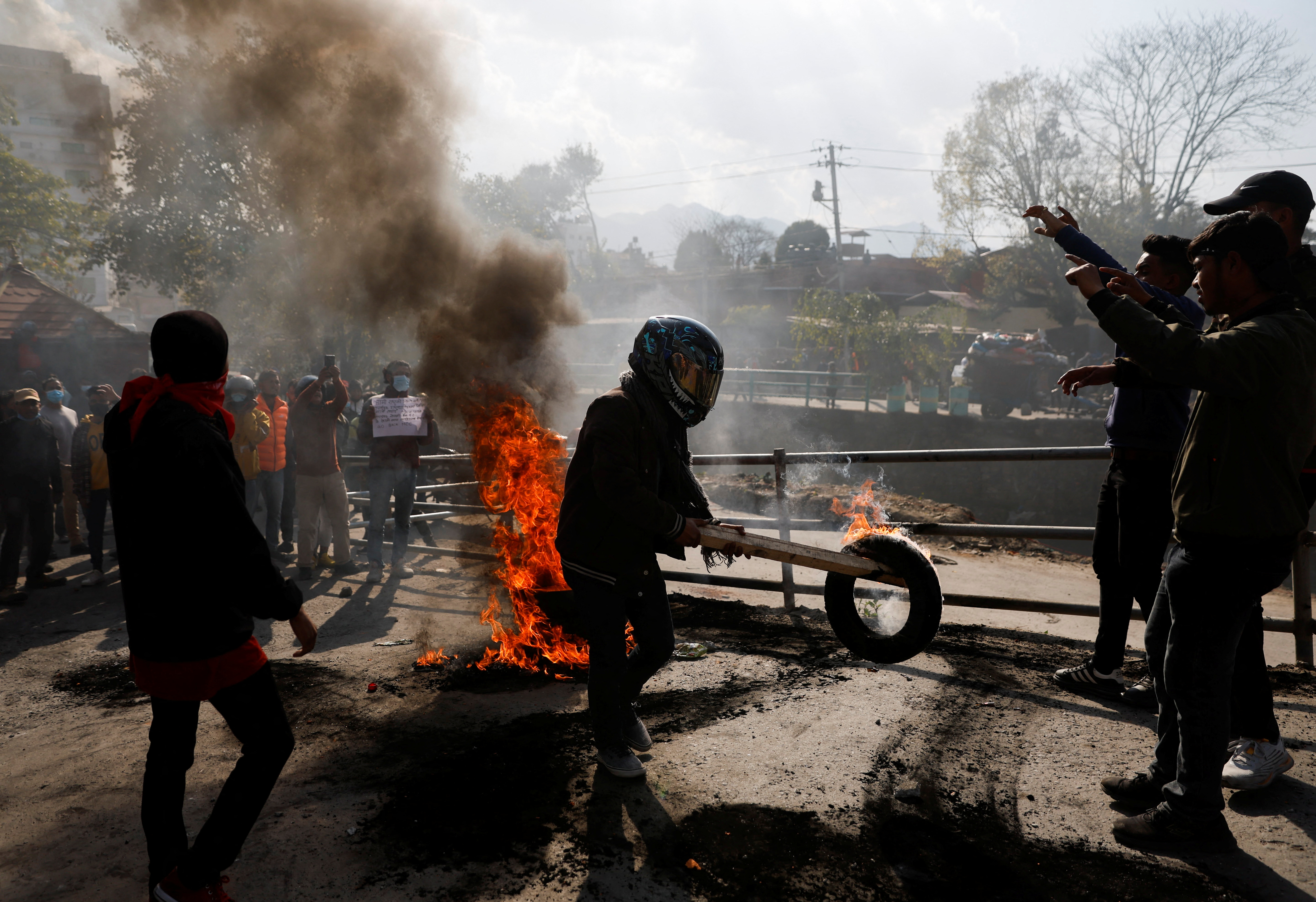 Nepali police clash with protesters opposed to U.S. aid grant in Kathmandu