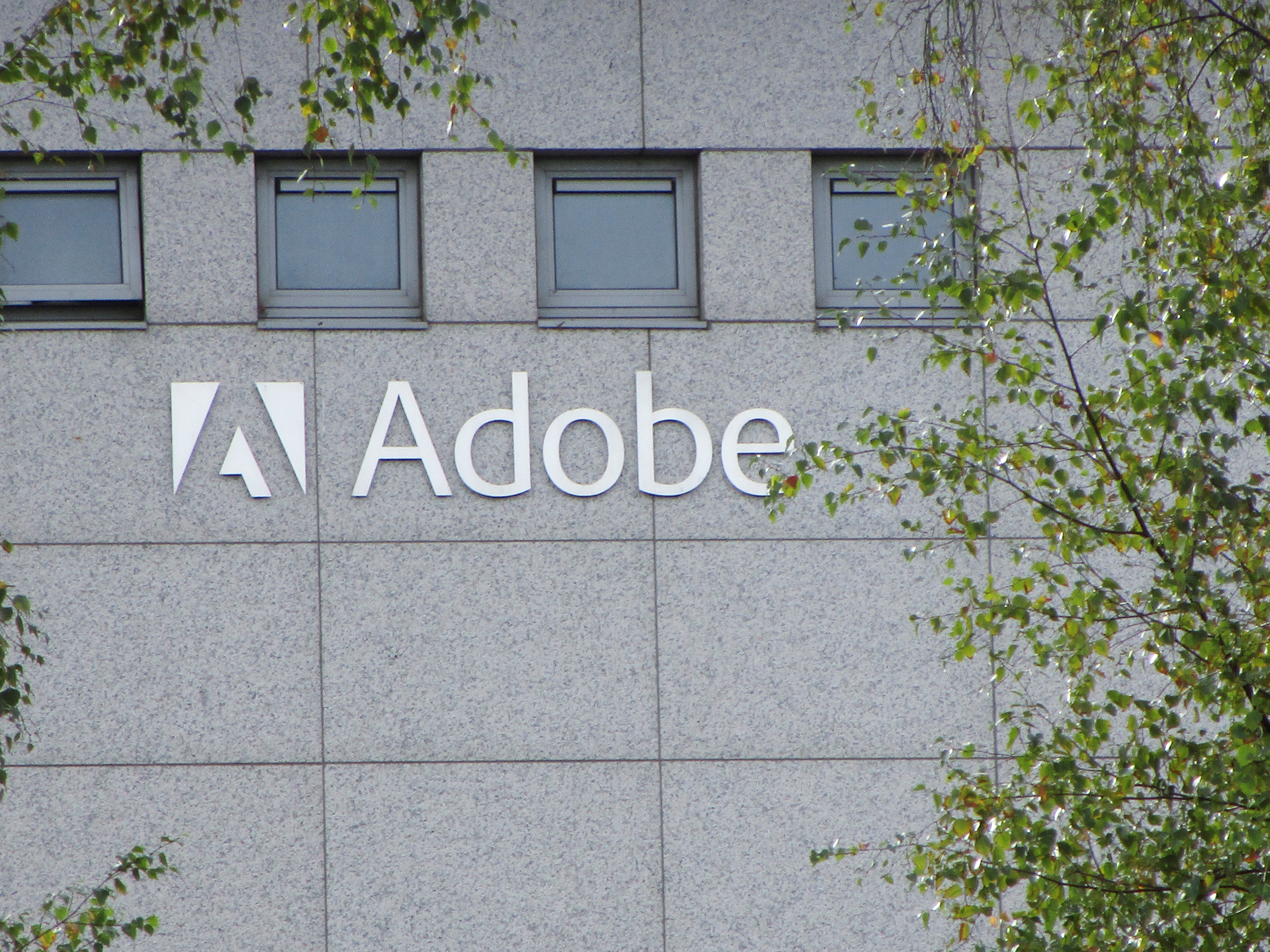 Logo of Adobe Inc. is pictured at the company's office in Citywest Business Campus, Saggart