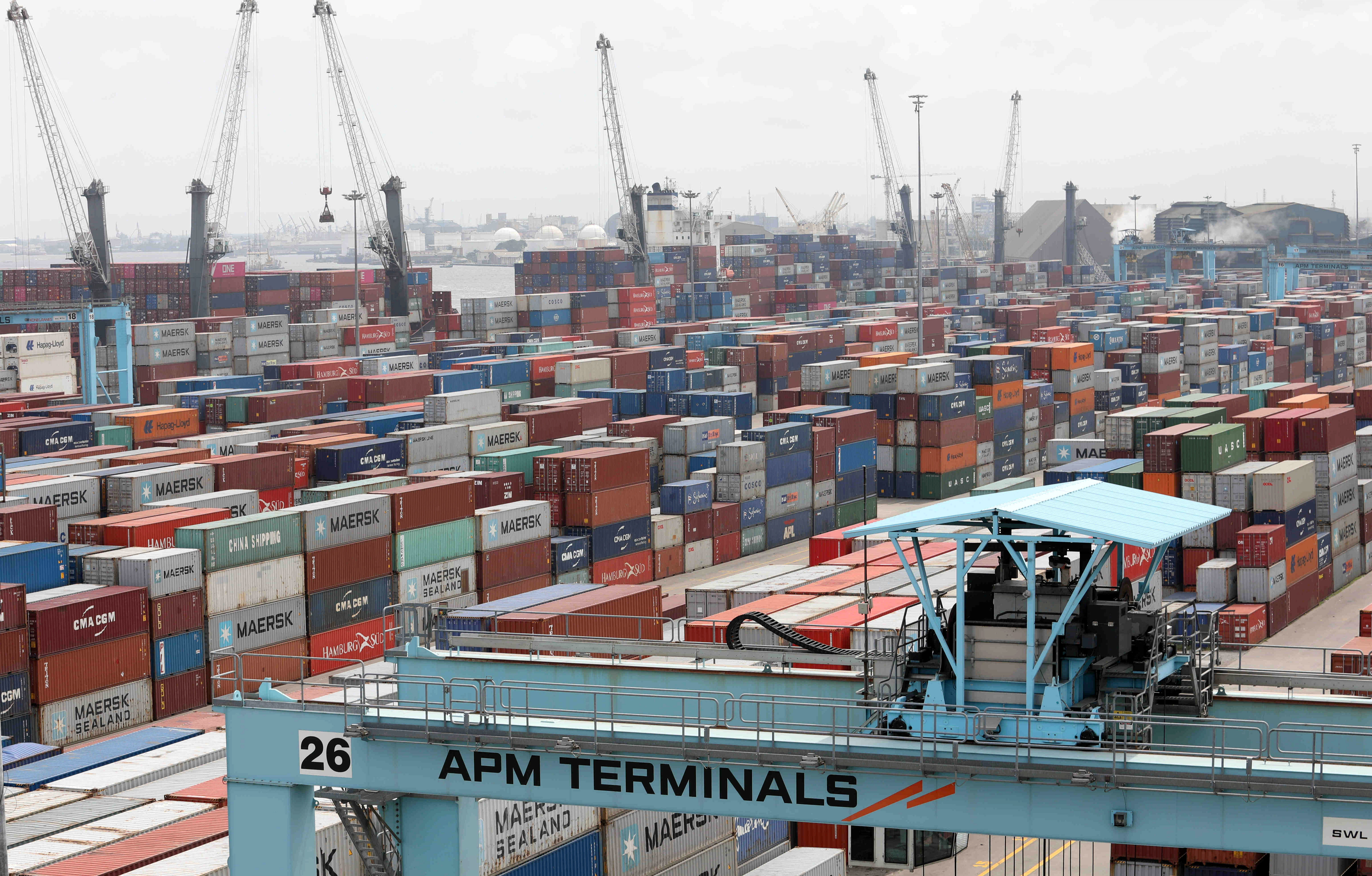 Cranes and containers seen at APM Terminals at the gateway port in Apapa