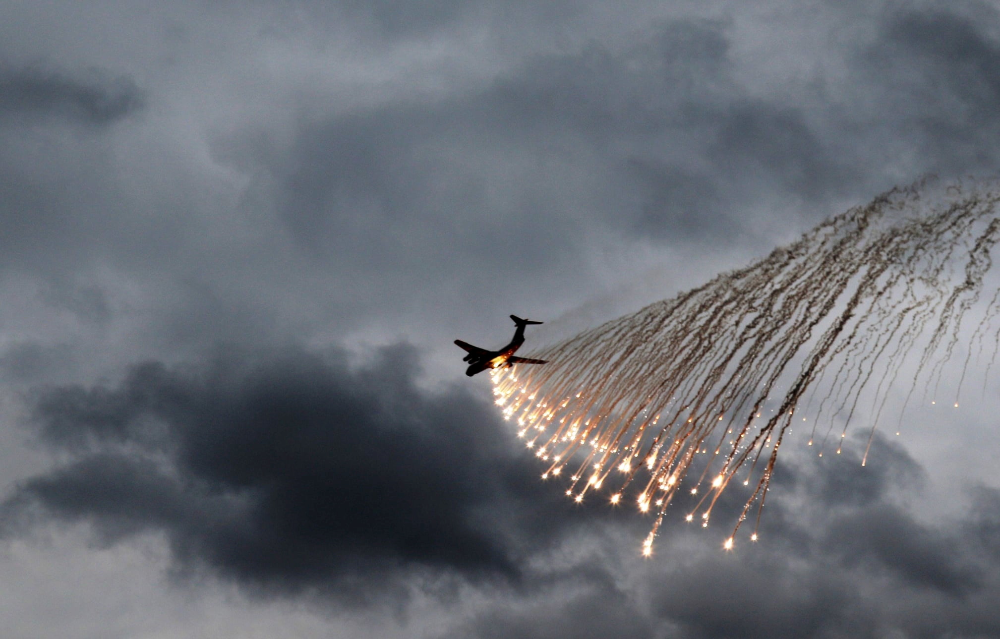A plane performs a flight during military drills of the Ukrainian Air Assault Forces in Zhytomyr Region, Ukraine November 21, 2021. Press service of the Ukrainian Air Assault Forces Command/Handout via REUTERS