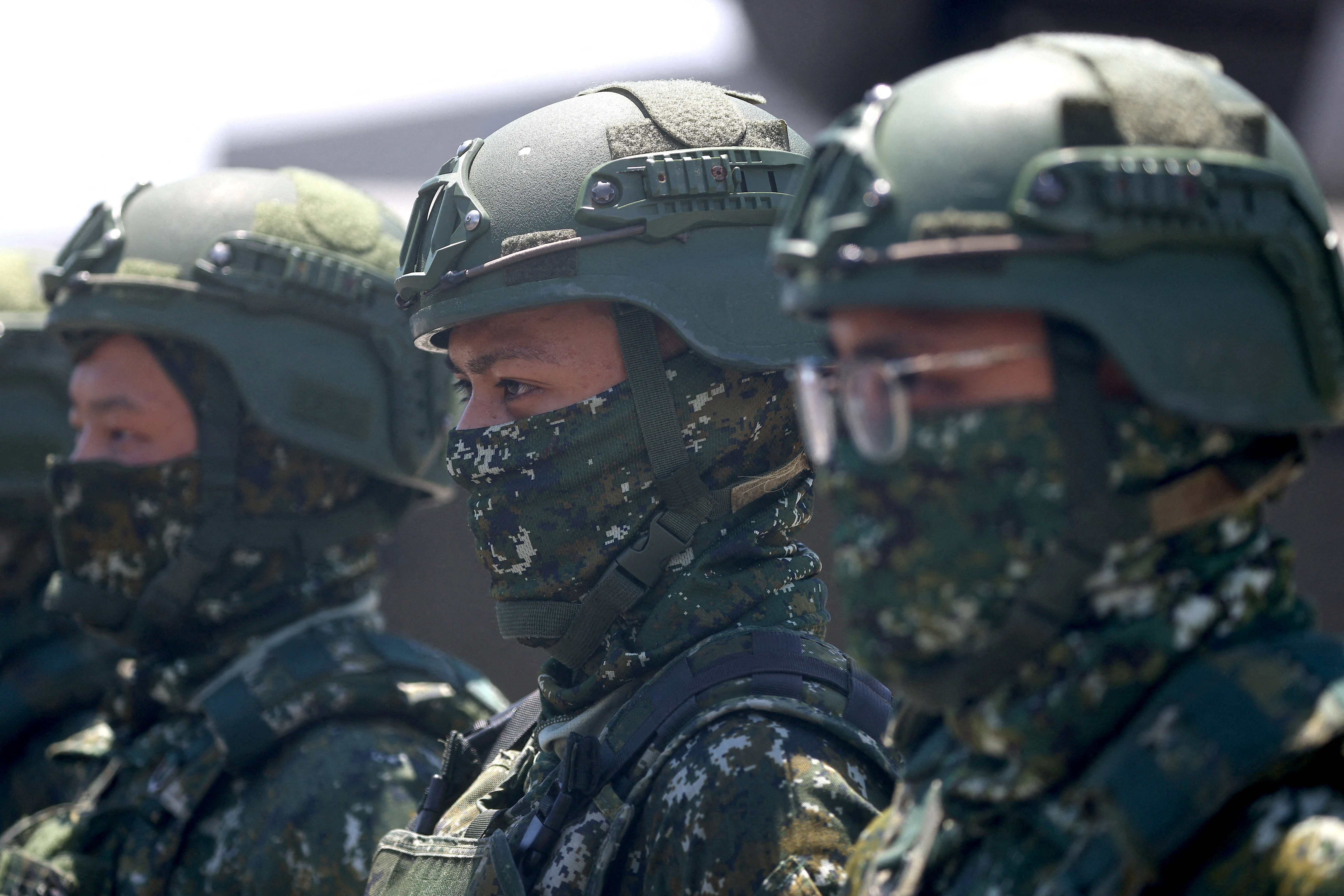 Soldiers stand guard at an airbase in Hualien