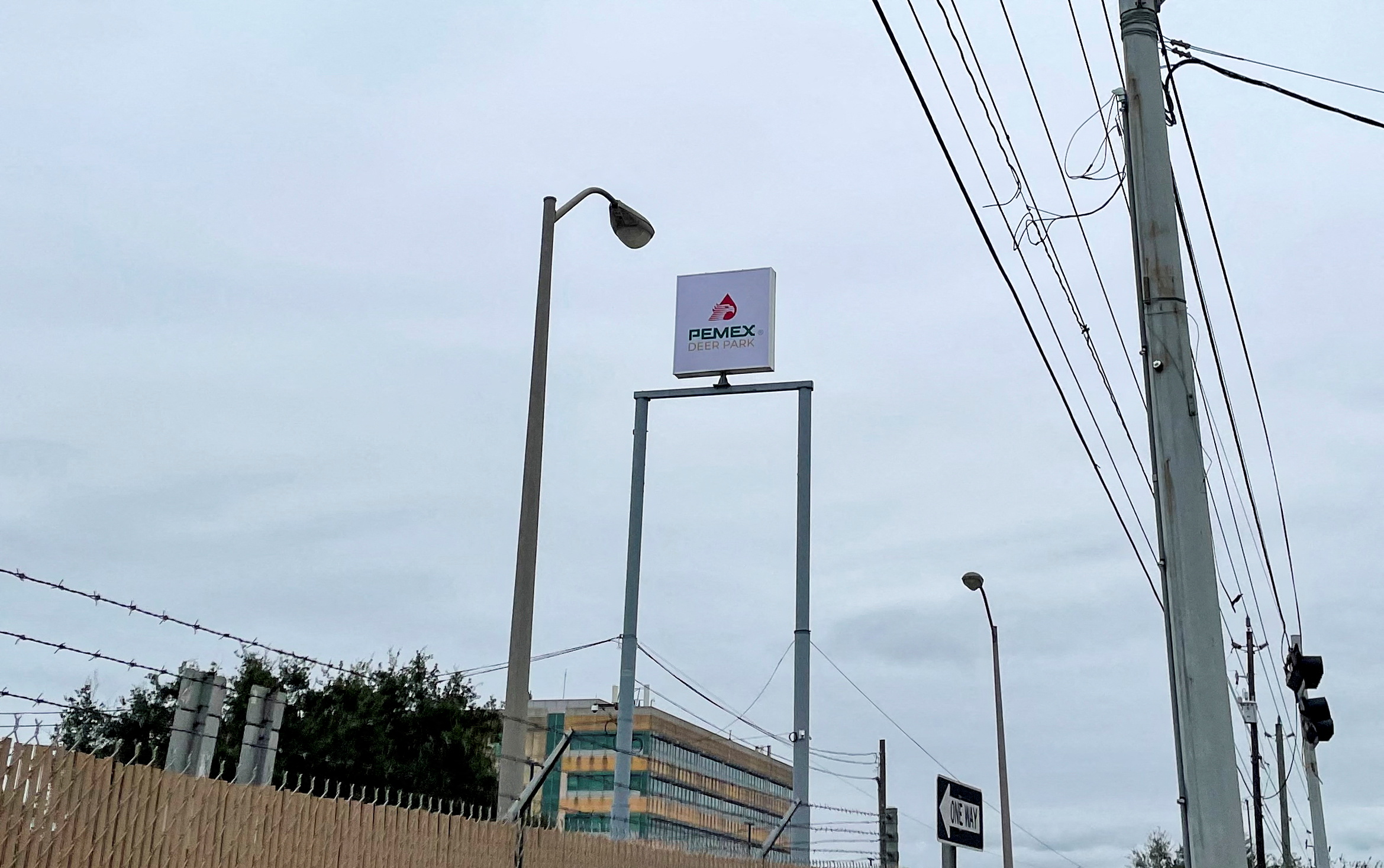 A new sign over a crude oil refinery, which shows the sole ownership of the plant by Mexico's national oil company Pemex, is pictured in Deer Park