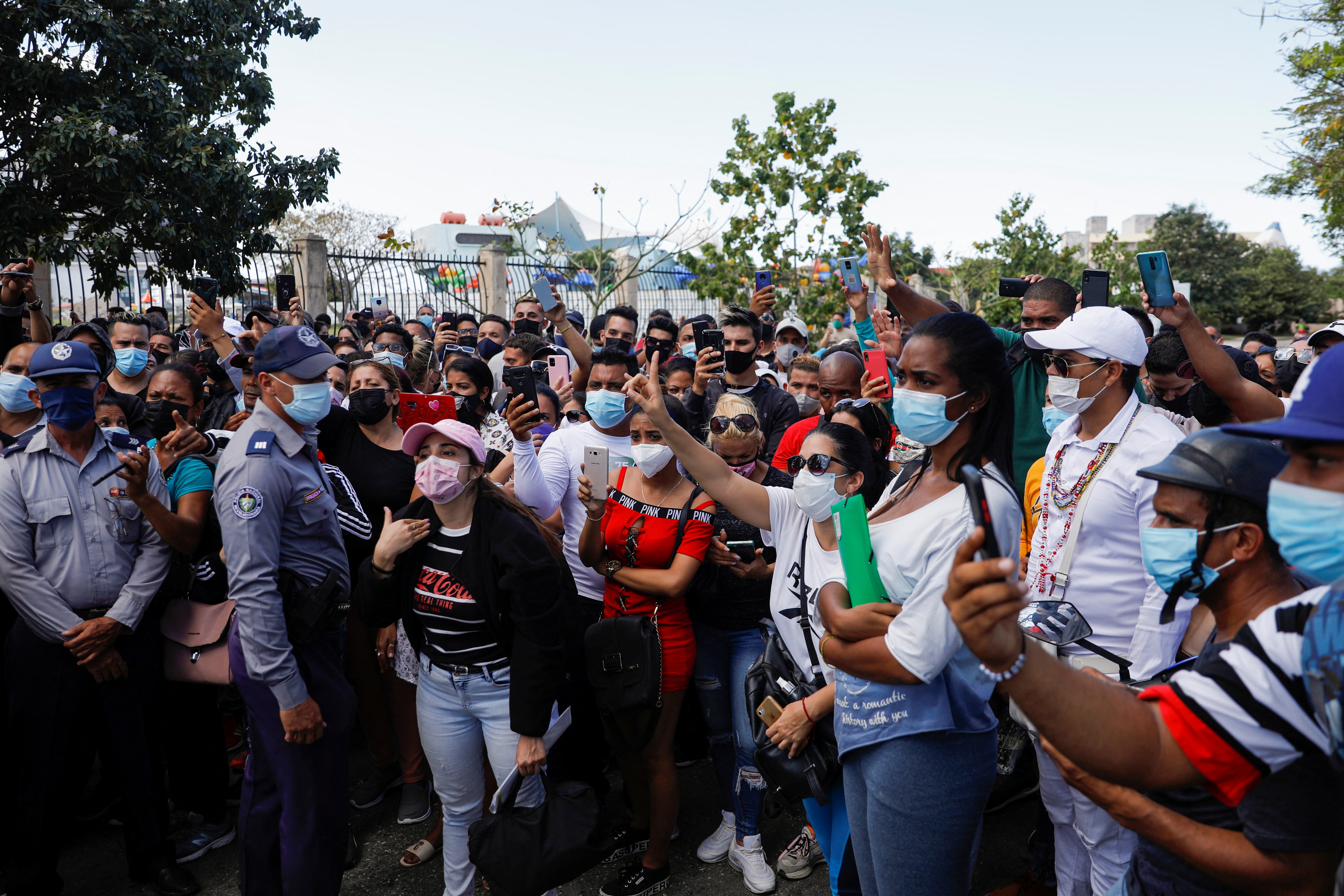 People crowd near Costa Rica embassy after the country imposed visa requirements for Cubans as migration surges, in Havana