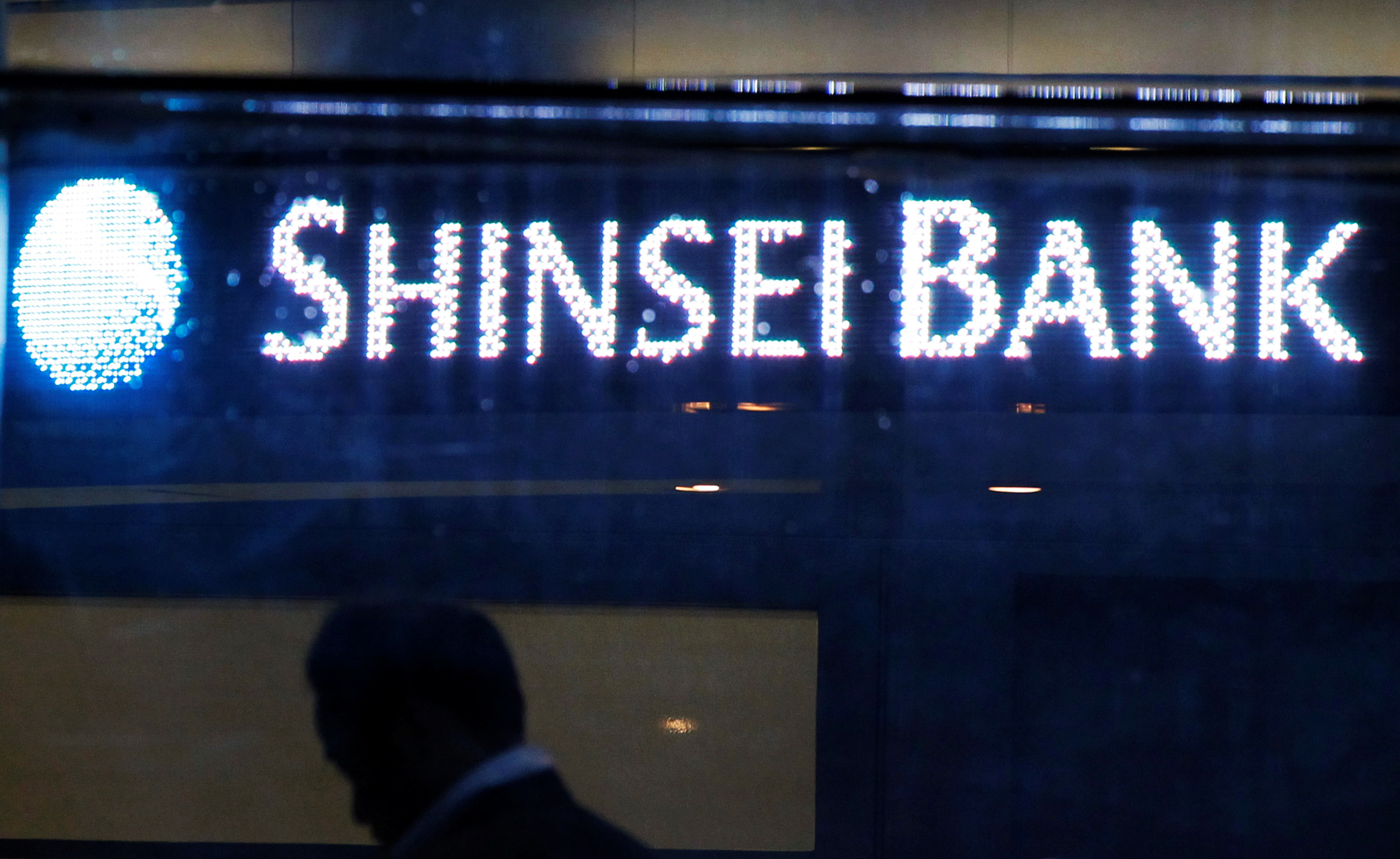 The Shinsei Bank logo is pictured at the lobby of the bank in Tokyo