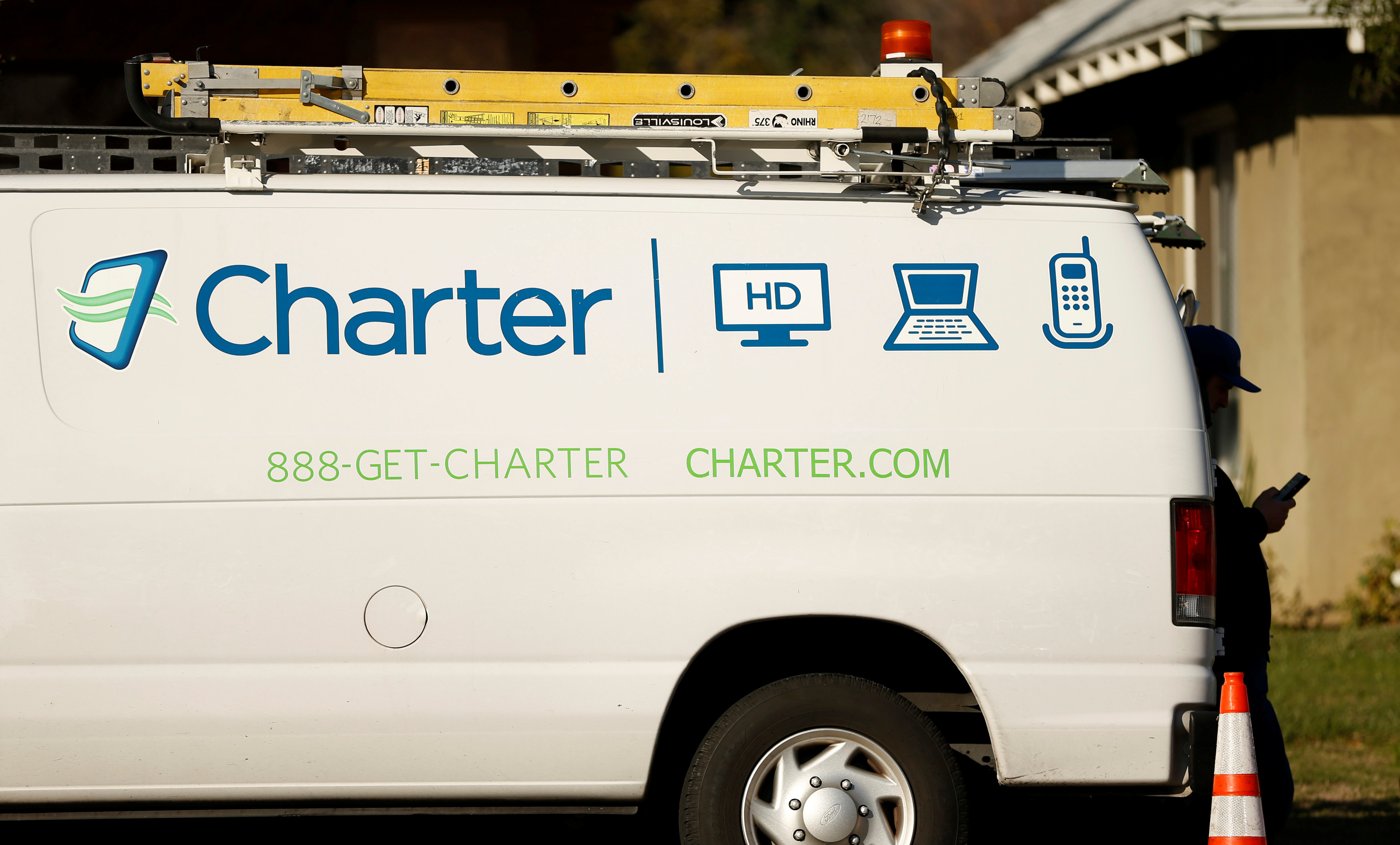 A Charter Communications company service van is pictured in Pasadena