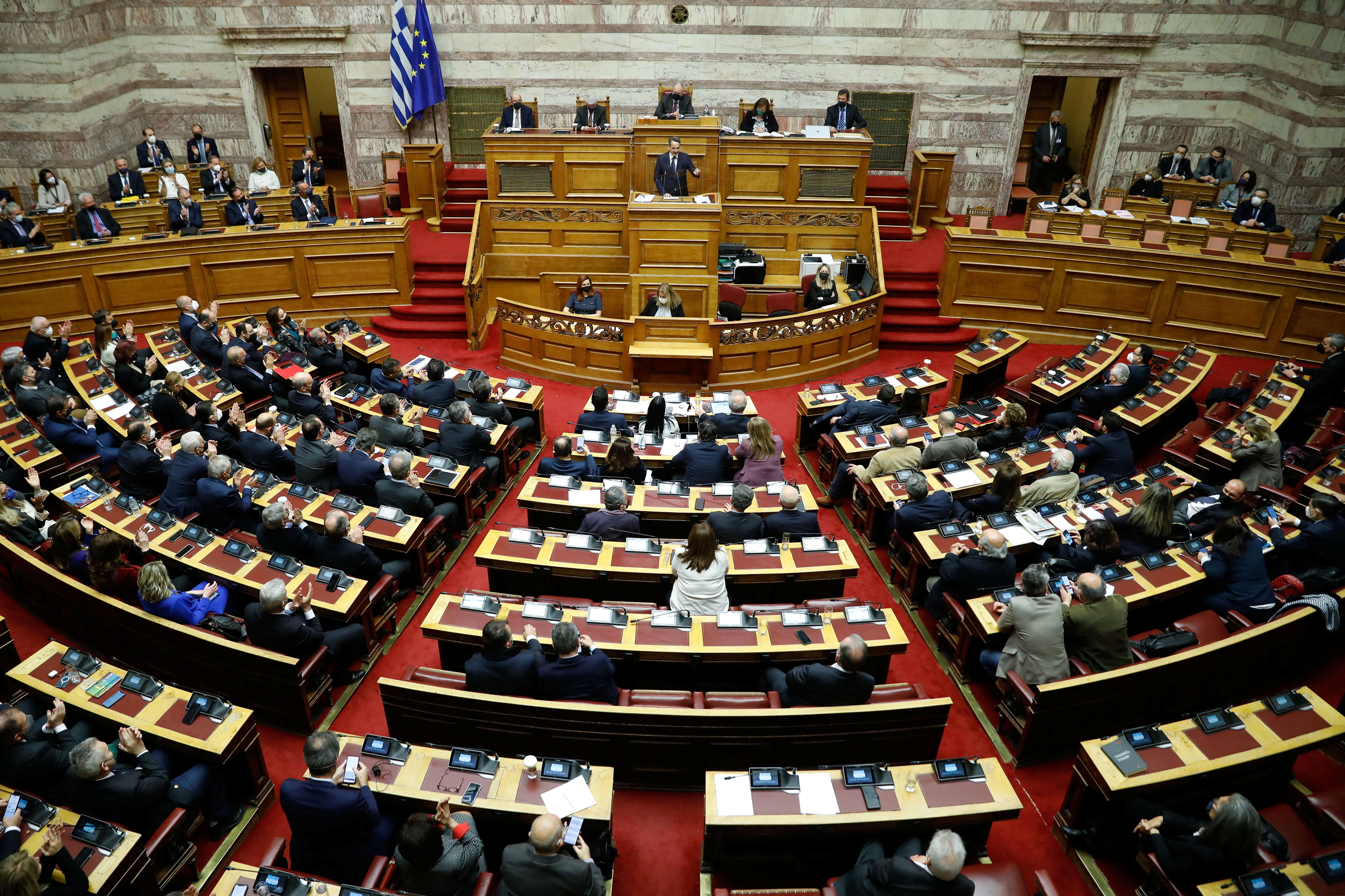 Ο Έλληνας Πρωθυπουργός Κυριάκος Μητσοτάκης μιλάει κατά τη διάρκεια κοινοβουλευτικής συνόδου πριν από την ψήφο εμπιστοσύνης στην Αθήνα, Ελλάδα, 30 Ιανουαρίου 2022. REUTERS/Κώστας Μπαλτάς
