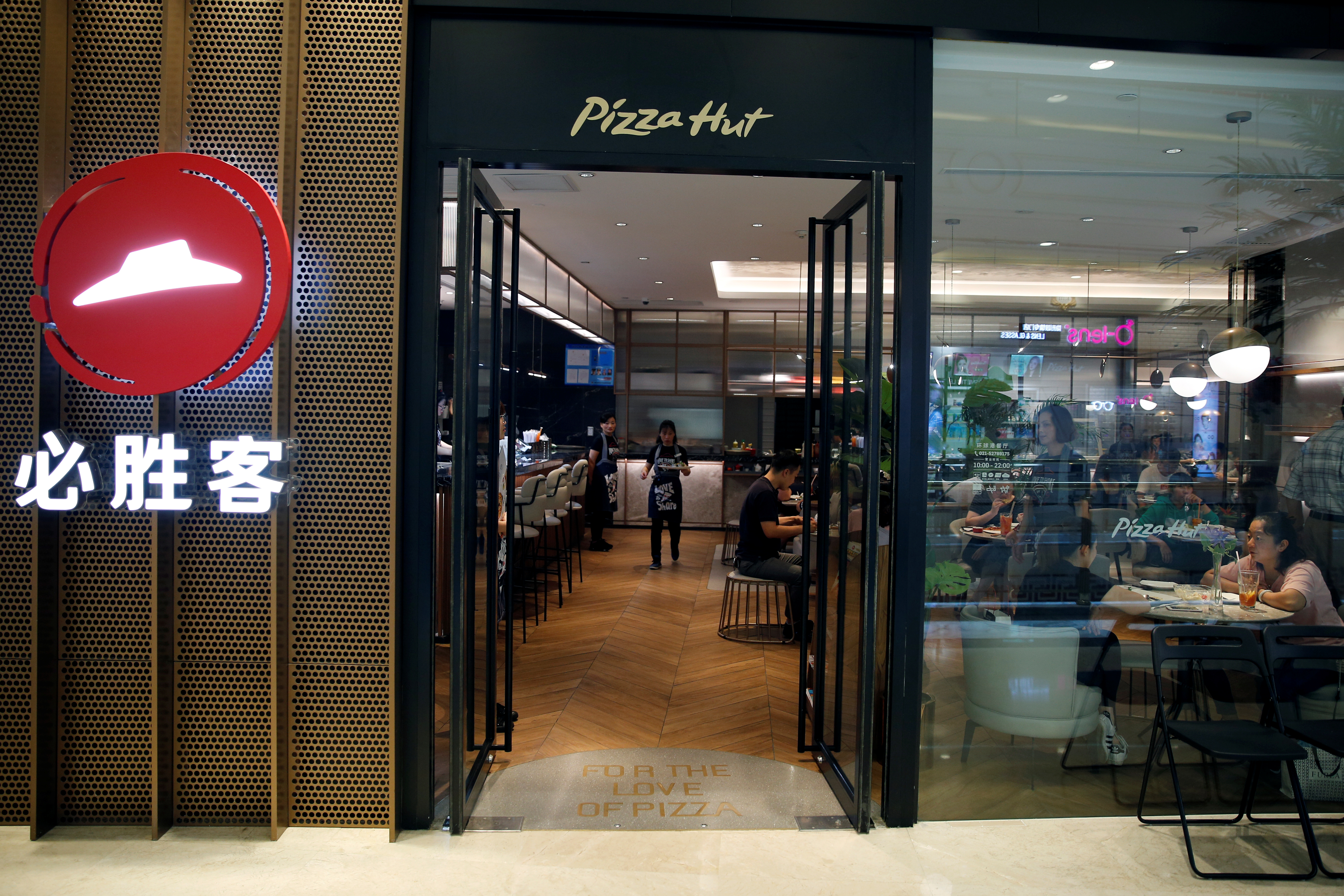 A Pizza Hut restaurant is seen in a mall in Shanghai,