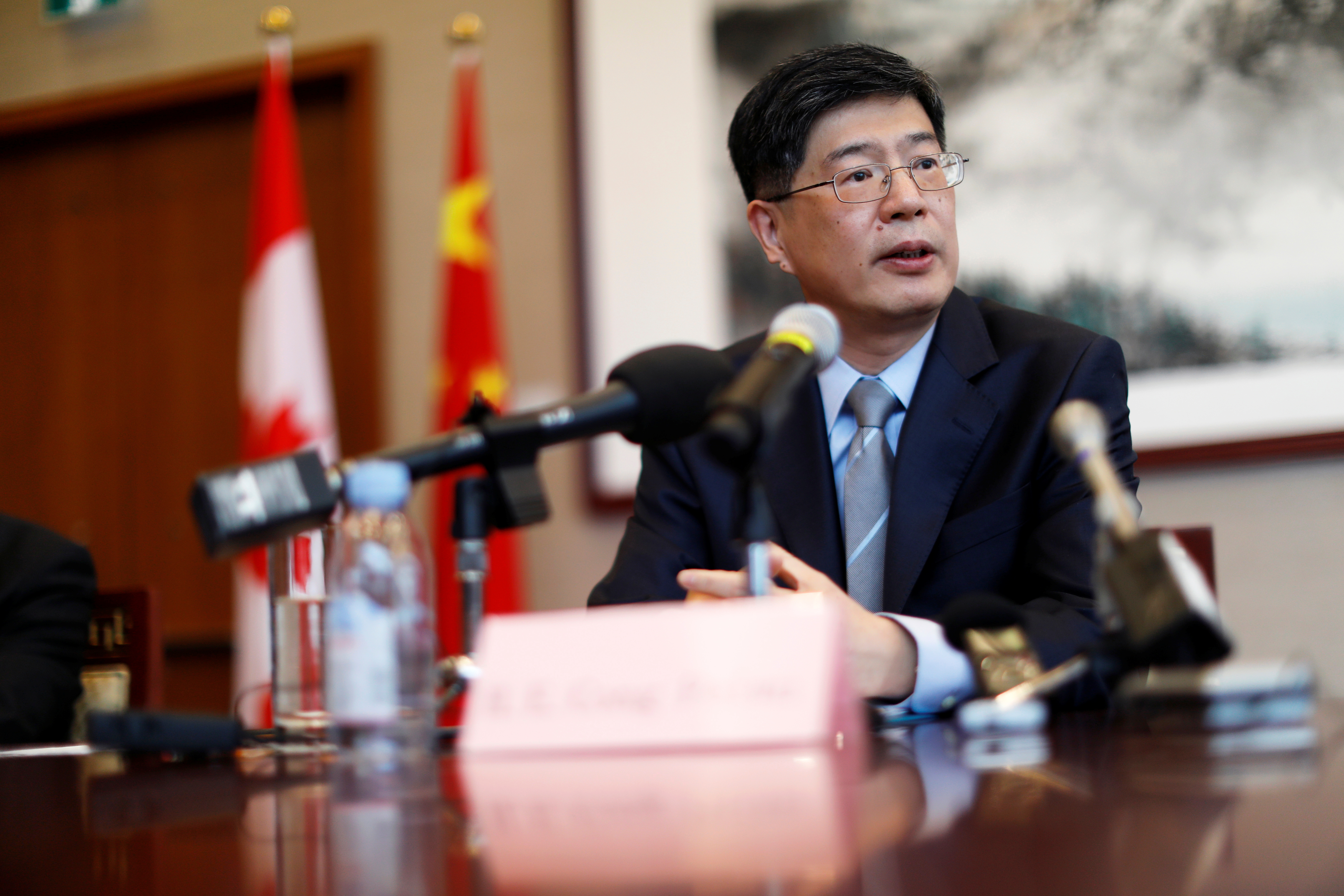 China's new ambassador to Canada Cong Peiwu speaks during a news conference for a small group of reporters at the Chinese Embassy in Ottawa