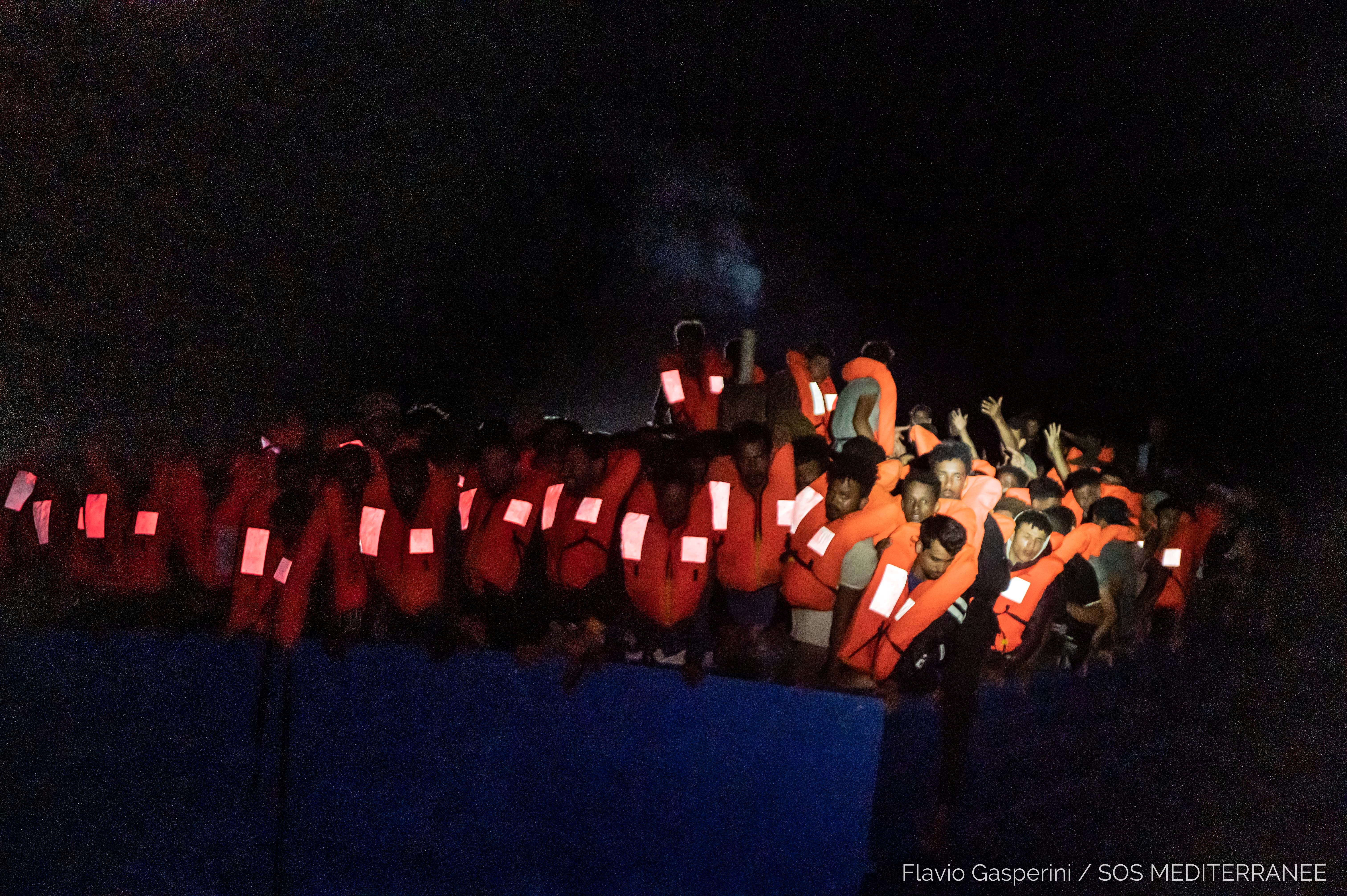 Migrants wait to be rescued by the Ocean Viking during a search and rescue (SAR) operation in the Mediterranean Sea, July 5, 2021. Picture taken July 5, 2021. Flavio Gasperini/SOS Mediterranee/Handout via REUTERS ATTENTION EDITORS - THIS IMAGE HAS BEEN SUPPLIED BY A THIRD PARTY. NO RESALES. NO ARCHIVES. MANDATORY CREDIT
