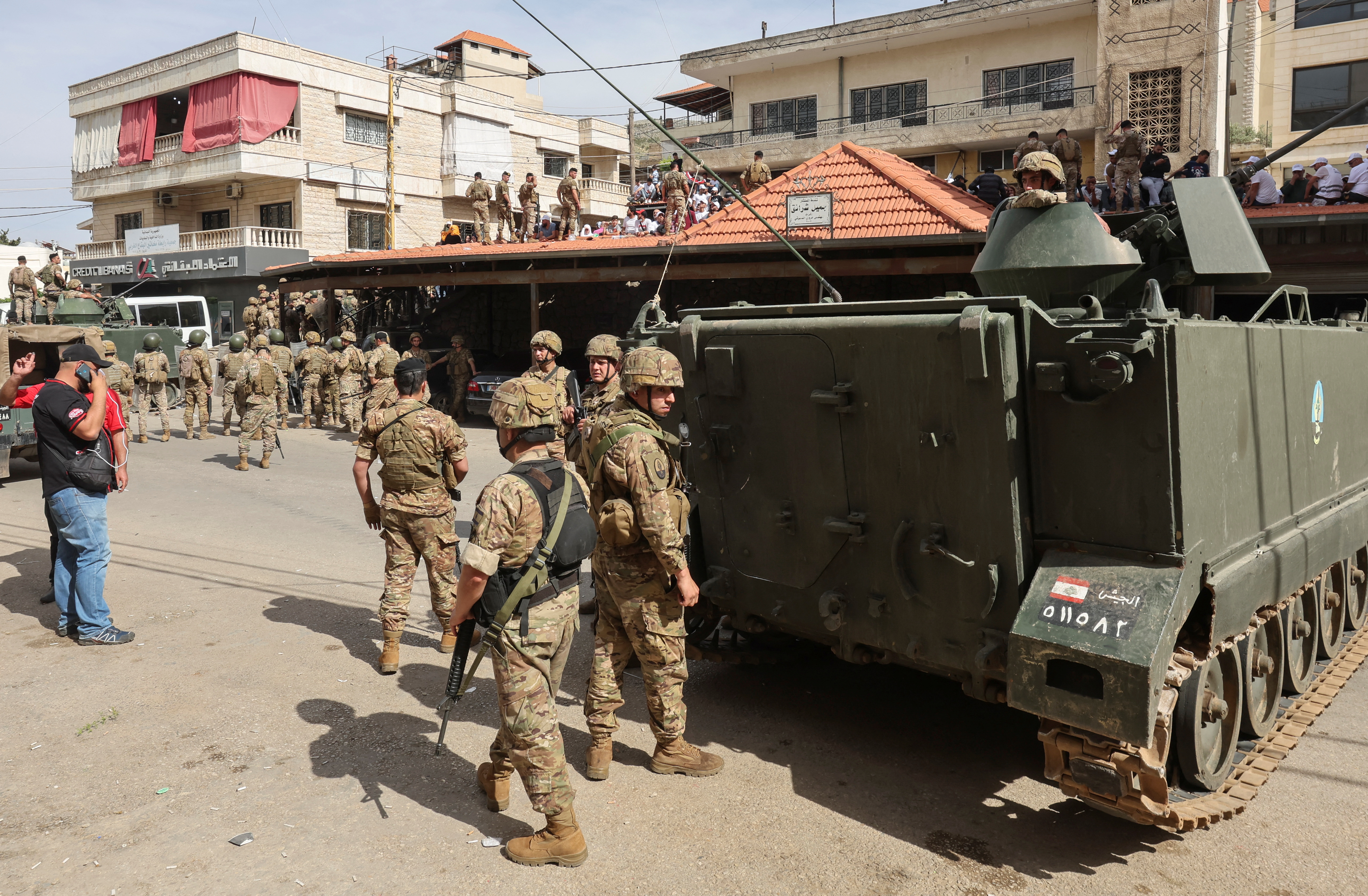 Lebanese army soldiers deploy outside a local government building where electoral workers count ballots cast in parliamentary elections, in Jeb Jennin