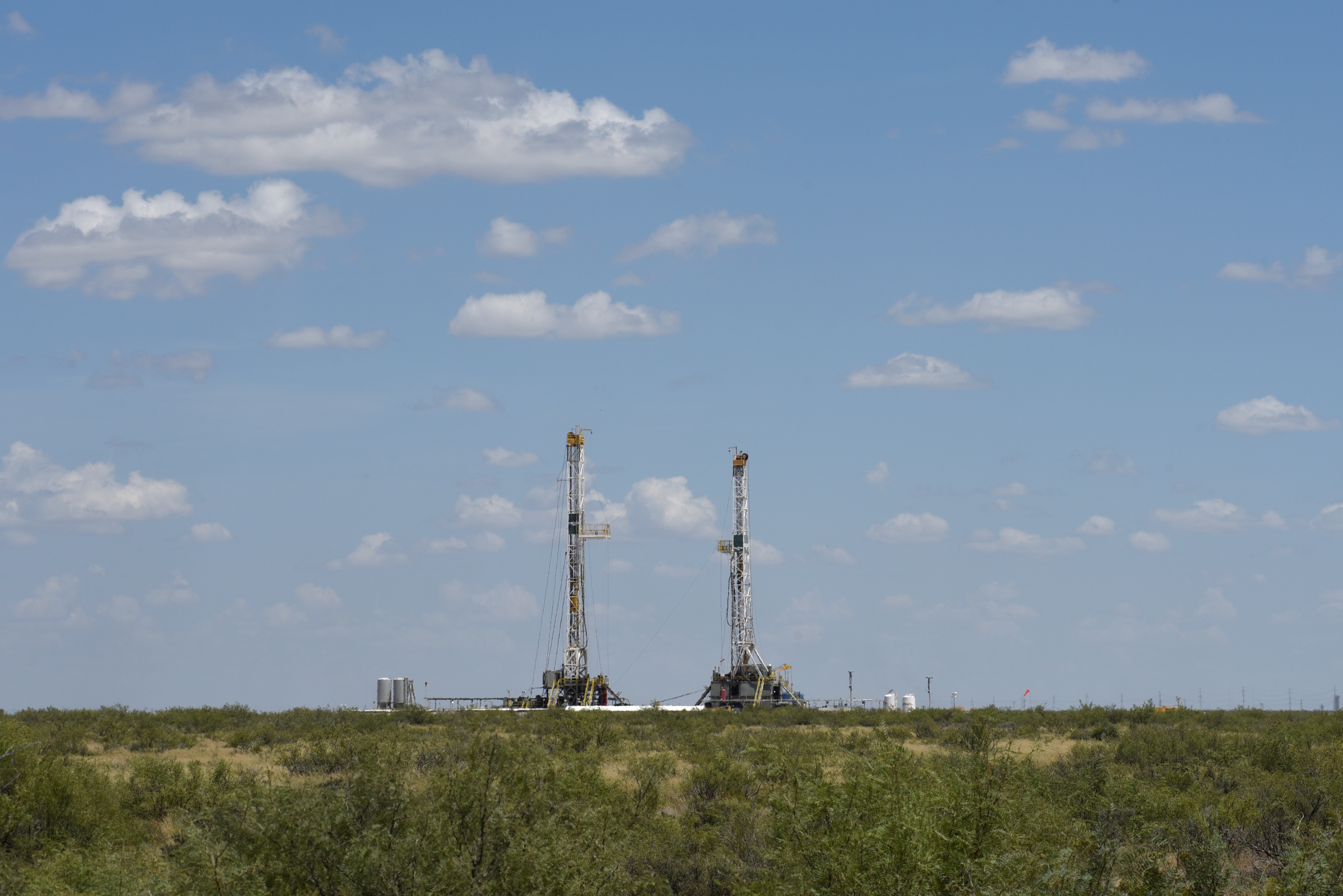 Horizontal drilling rigs operate in the Permian Basin oil production area near Wink