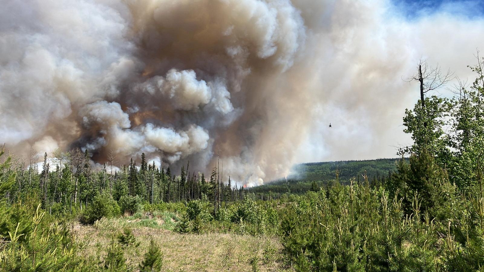 Smoke billows from the West Kiskatinaw River wildfire and Peavine Creek wildfires in the Dawson Creek Zone