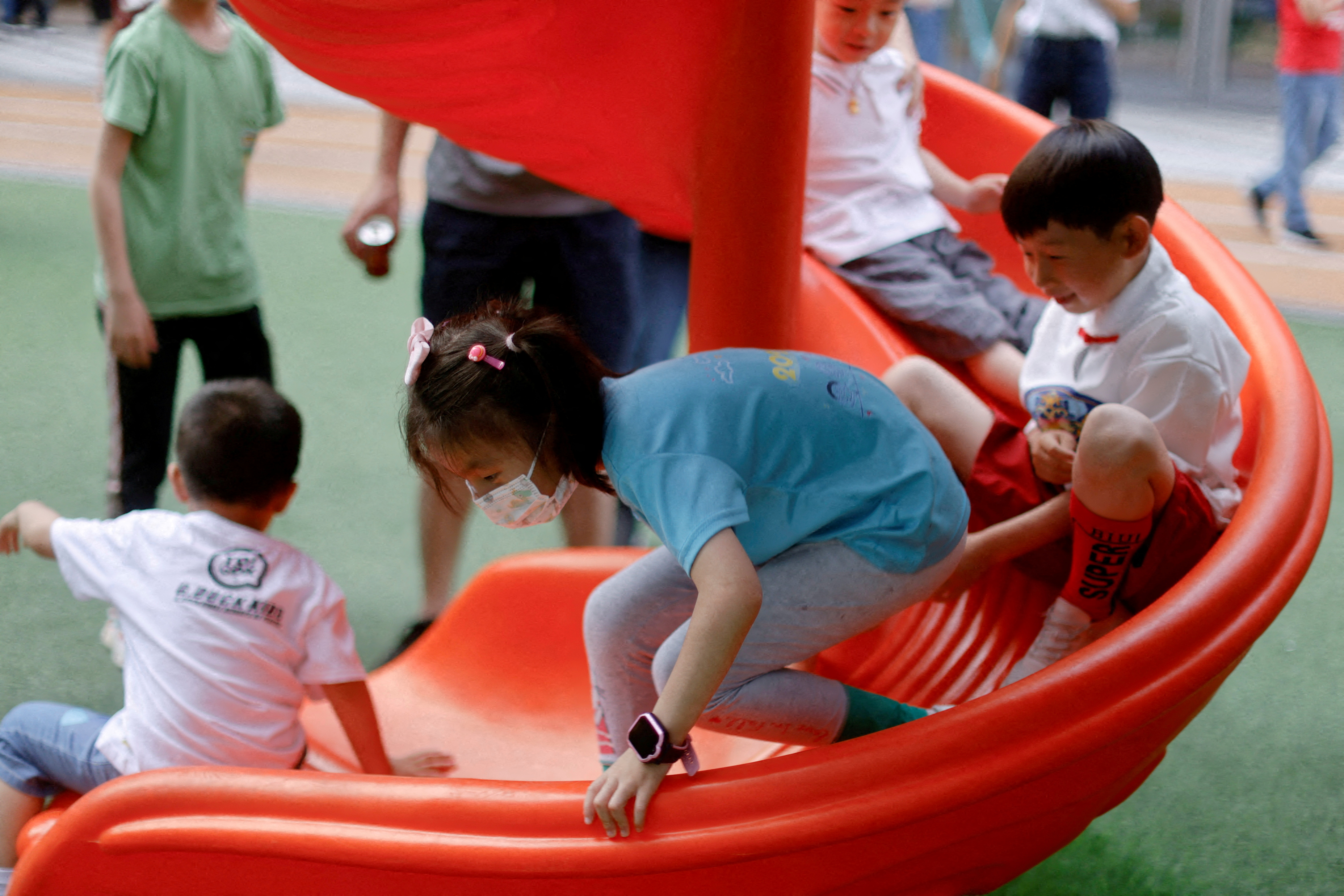 Children at a playground inside a shopping complex in Shanghai
